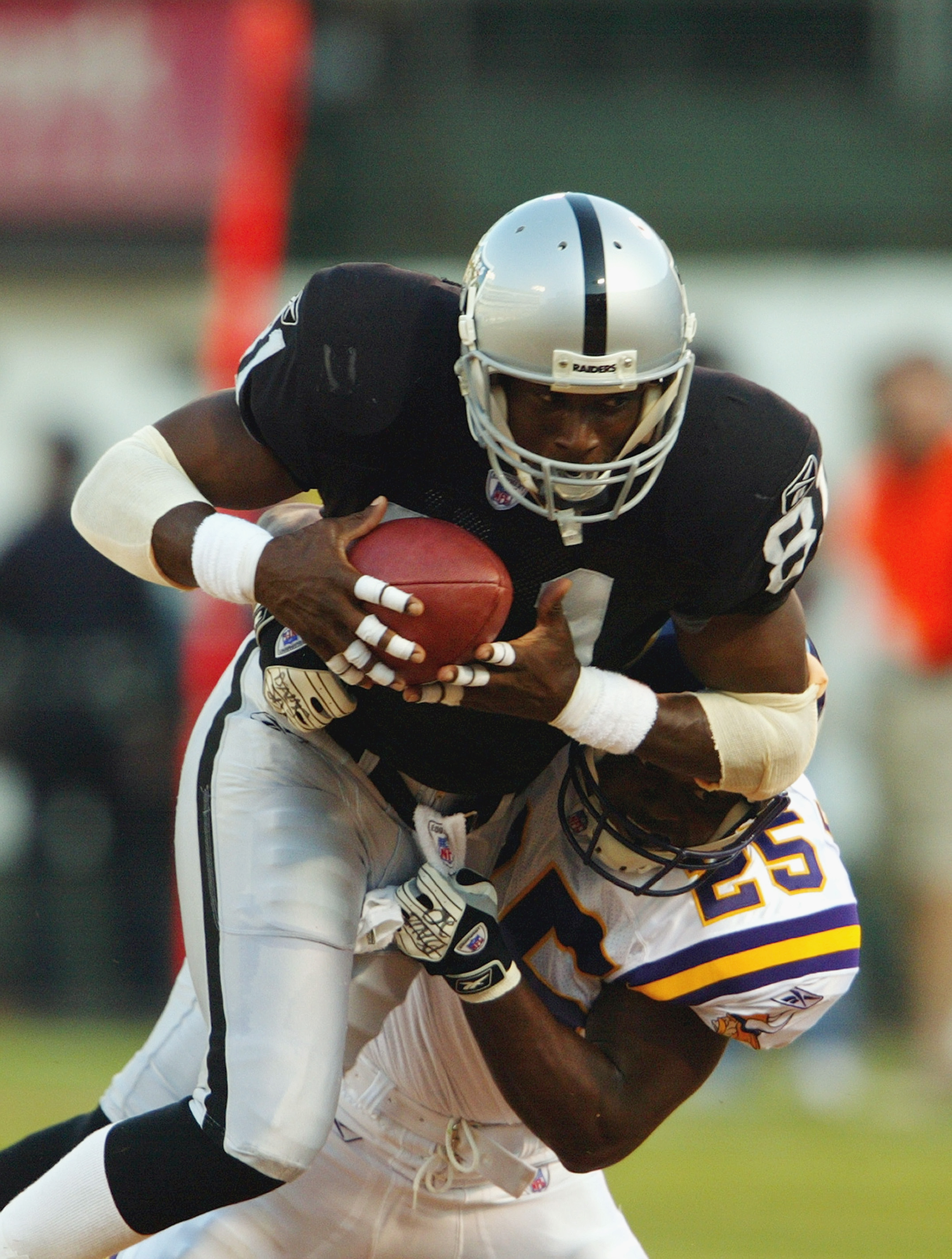 Tim Brown #81 with a reception vs the New York Jets.