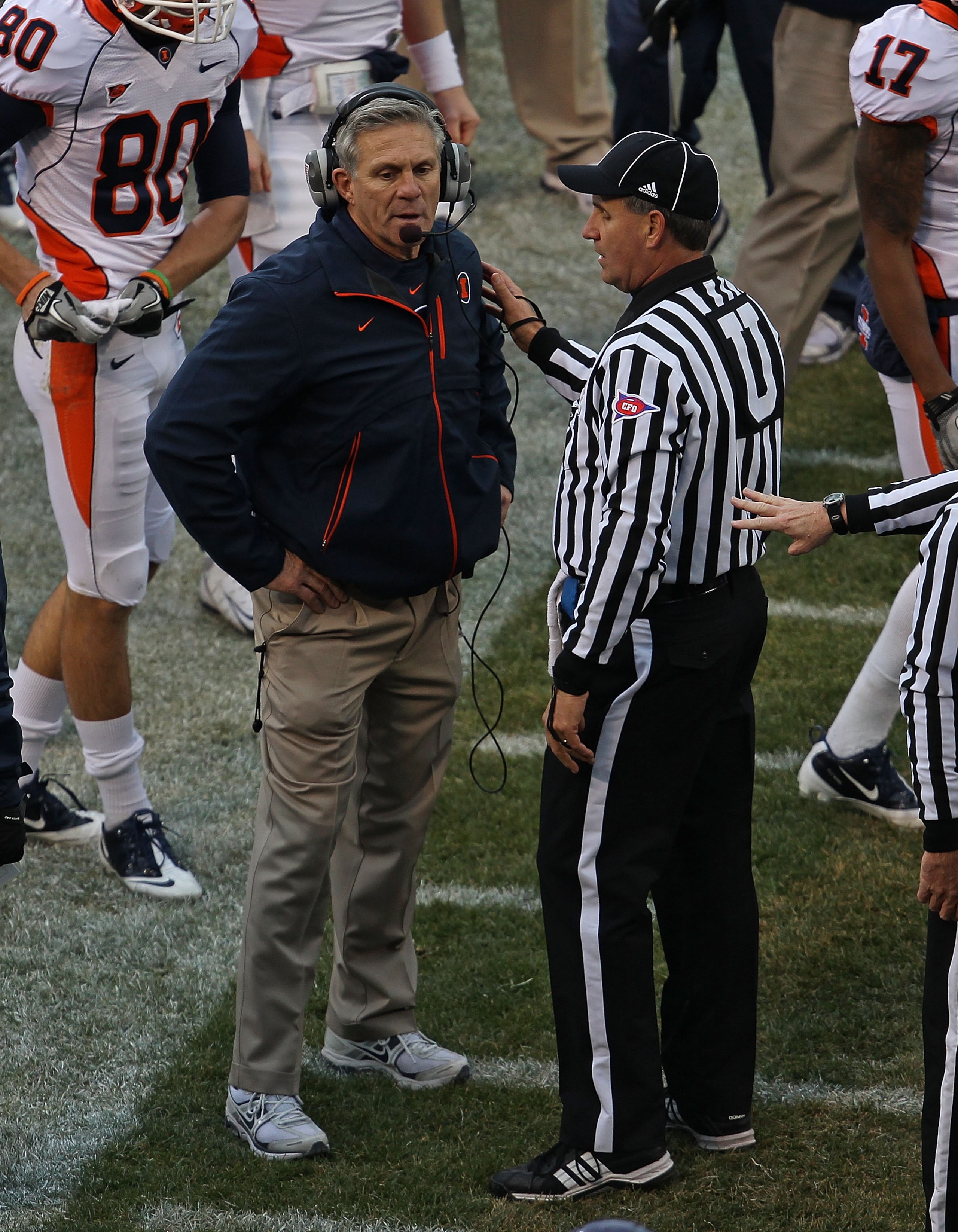 CHICAGO - NOVEMBER 20: Head coach Ron Zook of the Illinois Fighting Illini talks to a referee during a game against the Northwestern Wildcats played at Wrigley Field on November 20, 2010 in Chicago, Illinois. (Photo by Jonathan Daniel/Getty Images)