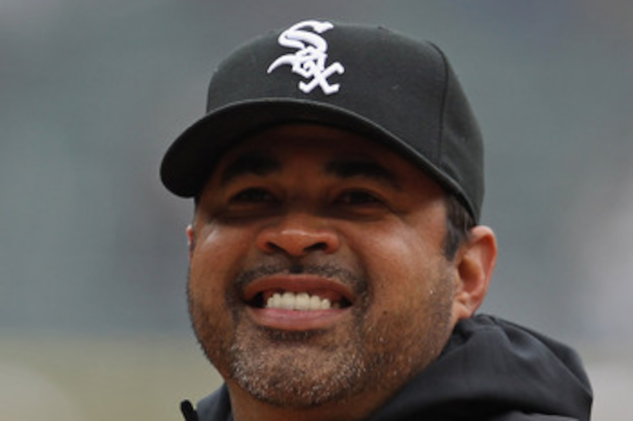 CHICAGO, IL - APRIL 07: Manager Ozzie Guillen #13 of the Chicago White Sox smiles at fans before the home opener against the Tampa Bay Rays at U.S. Cellular Field on April 7, 2011 in Chicago, Illinois. The White Sox defeated the Rays 5-1. (Photo by Jonath
