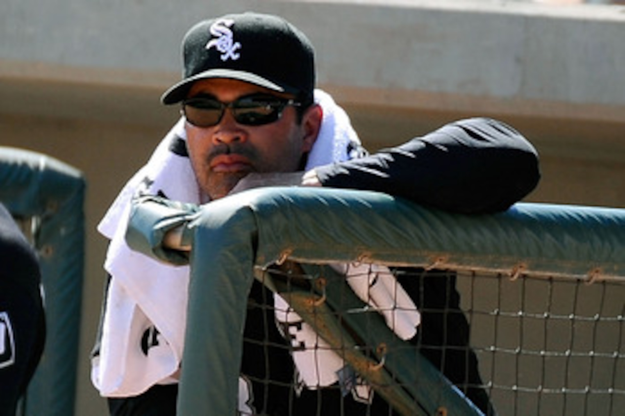 GLENDALE, AZ - MARCH 11:  Manager Ozzie Guillen #13 of the Chicago White Sox watches play in the spring training baseball game against Chicago Cubs at Camelback Ranch on March 11, 2011 in Glendale, Arizona.  (Photo by Kevork Djansezian/Getty Images)