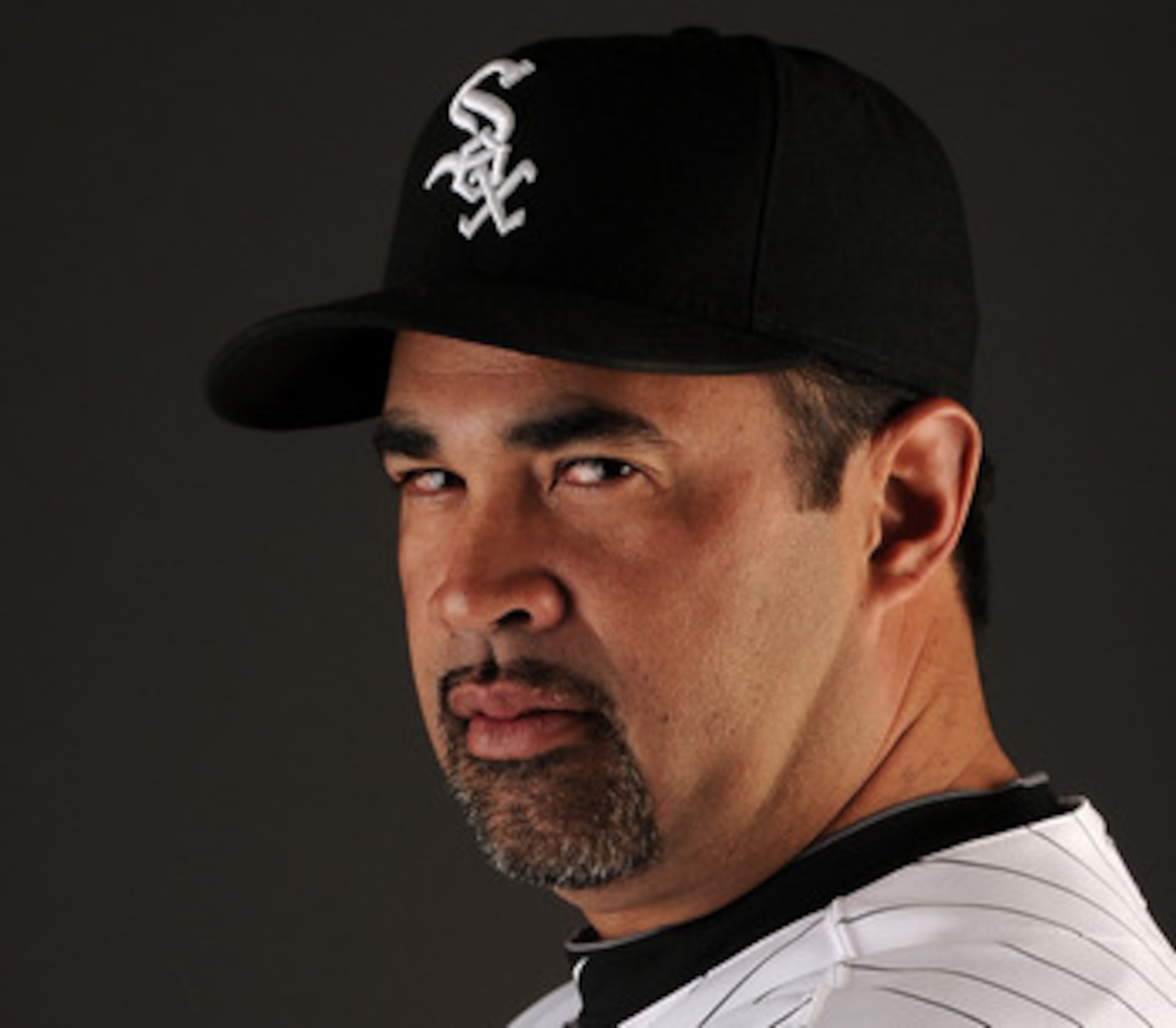 GLENDALE, AZ - FEBRUARY 26:  Manager Ozzie Guillen #13 of the Chicago White Sox poses for a photo on photo day at Camelback Ranch on February 26, 2011 in Glendale, Arizona.  (Photo by Harry How/Getty Images)