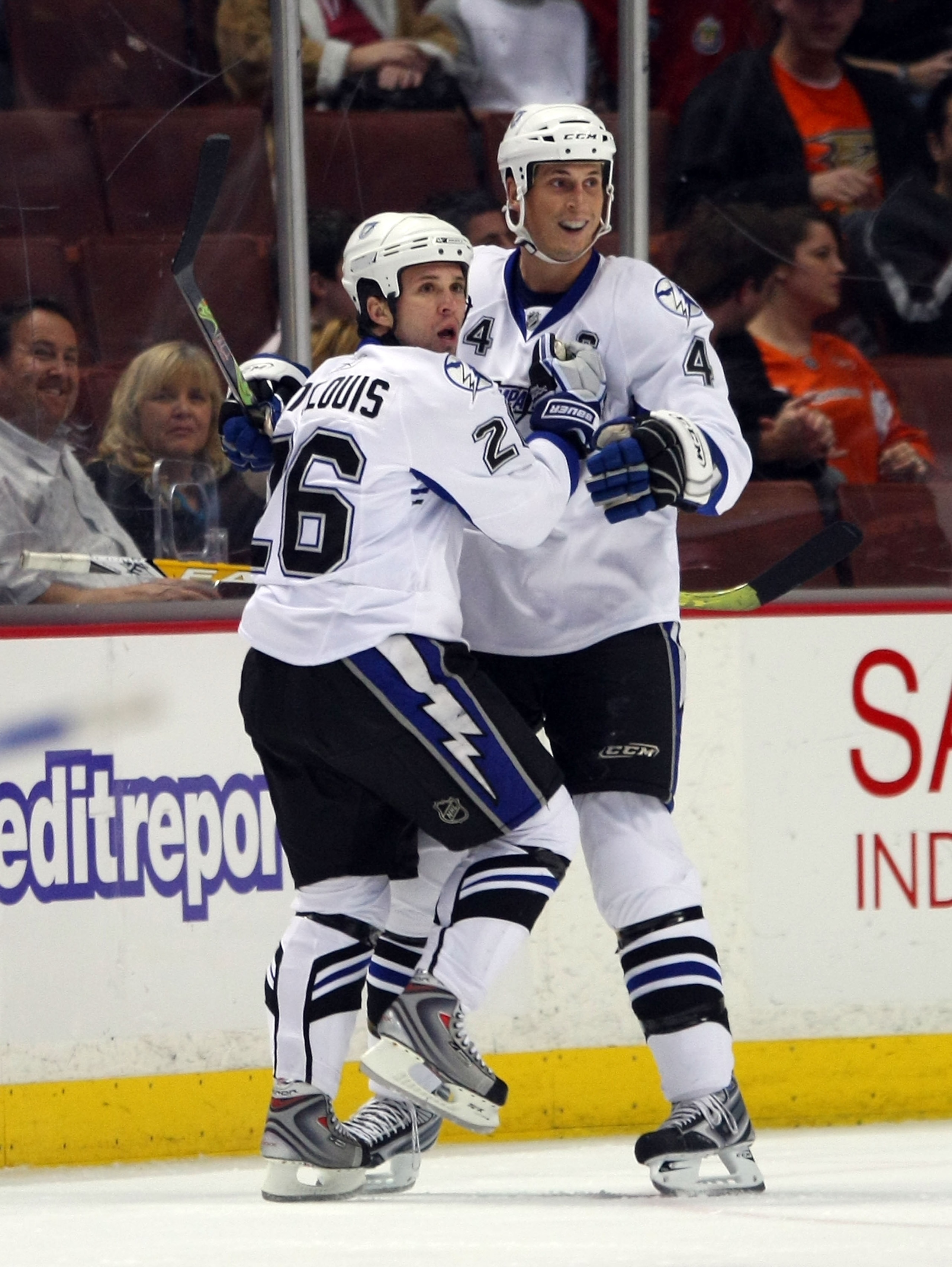 ANAHEIM, CA - JANUARY 09: Martin St. Louis #26 and Vincent Lecavalier #4 of the Tampa Bay Lightning celebrate St. Louis' short handed goal at 3:28 of the first period against the Anaheim Ducks on January 9, 2009 at the Honda Center in Anaheim, California.