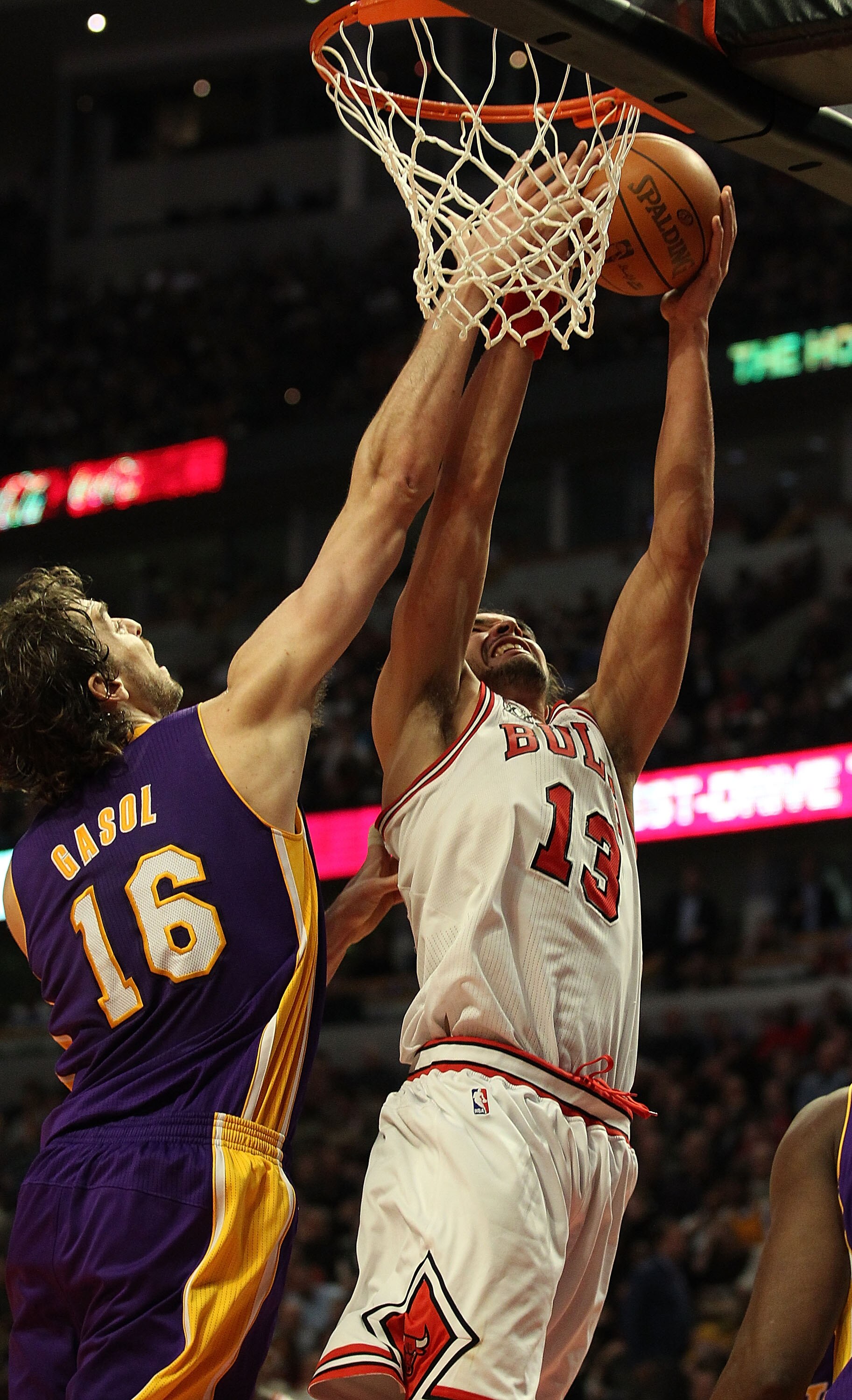 CHICAGO, IL - DECEMBER 10: Joakim Noah #13 of the Chicago Bulls puts up a shot as Pau Gasol #16 of the Los Angeles Lakers defends at the United Center on December 10, 2010 in Chicago, Illinois. The Bulls defeated the Lakers 88-84. NOTE TO USER: User expre