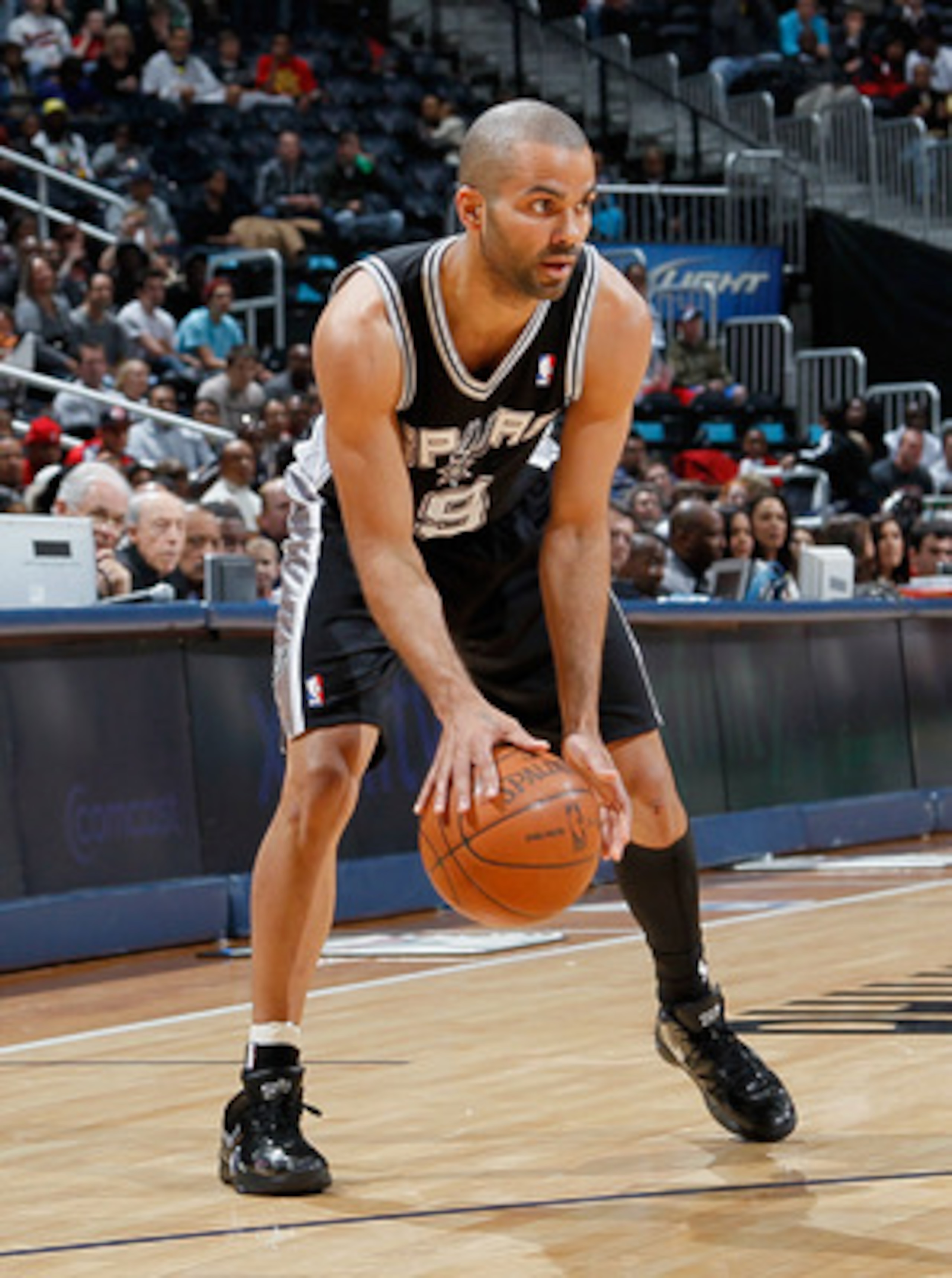 ATLANTA, GA - APRIL 05:  Tony Parker #9 of the San Antonio Spurs against the Atlanta Hawks at Philips Arena on April 5, 2011 in Atlanta, Georgia.  NOTE TO USER: User expressly acknowledges and agrees that, by downloading and/or using this Photograph, user