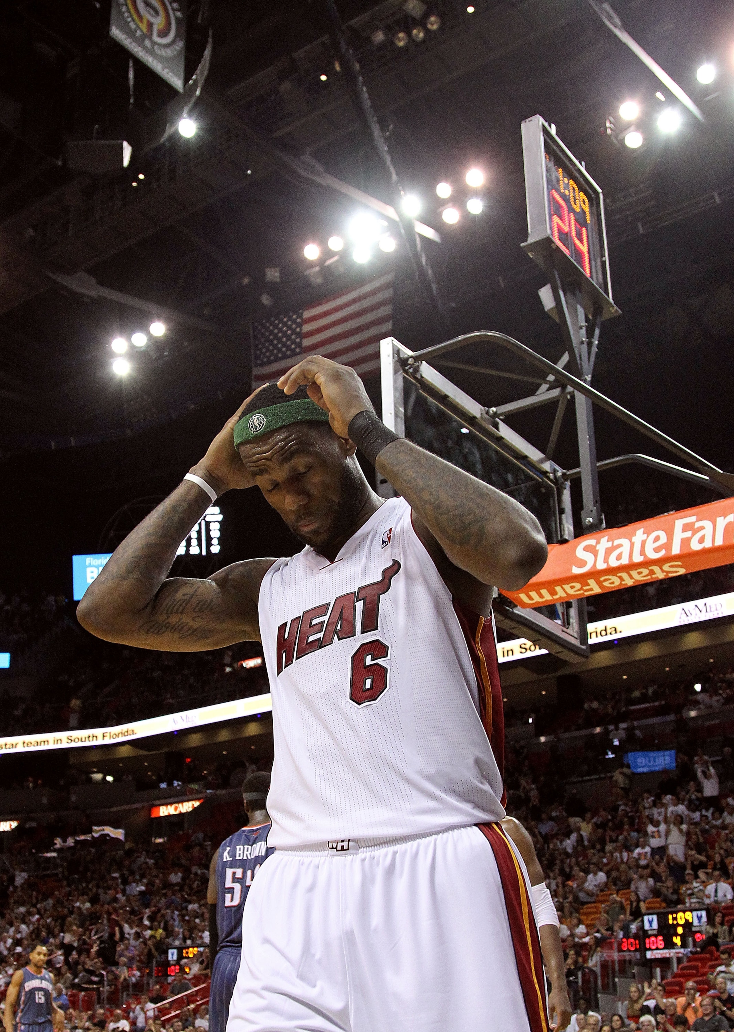 MIAMI, FL - APRIL 08:  LeBron James #6 of the Miami Heat reacts to a foul call during a game against the Charlotte Bobcats at American Airlines Arena on April 8, 2011 in Miami, Florida. NOTE TO USER: User expressly acknowledges and agrees that, by downloa