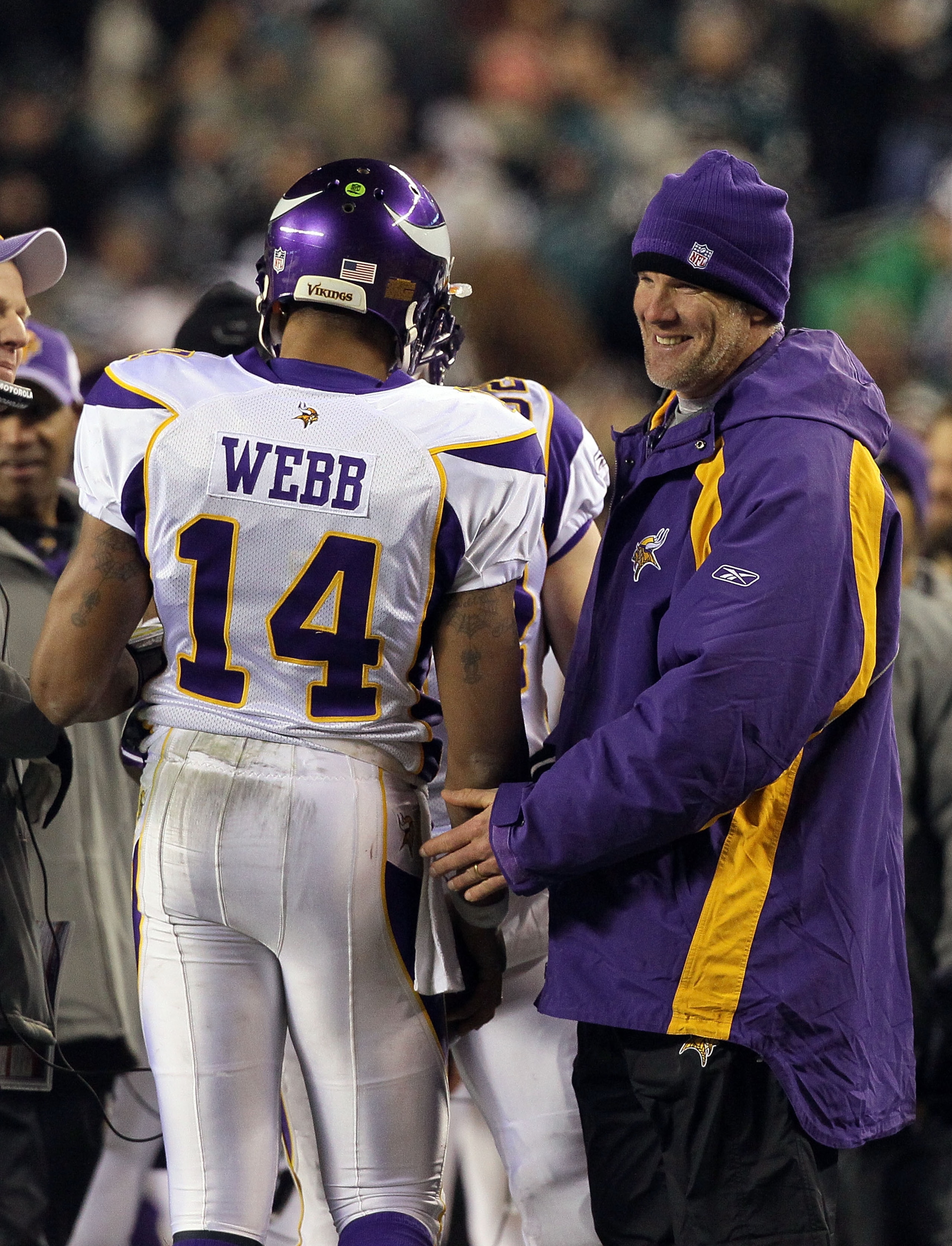 PHILADELPHIA, PA - DECEMBER 28: Injured Quarterback Brett Favre (R) #4 congratulates Joe Webb #14 of the Minnesota Vikings after scoring a touchdown against the Philadelphia Eagles at Lincoln Financial Field on December 28, 2010 in Philadelphia, Pennsylva
