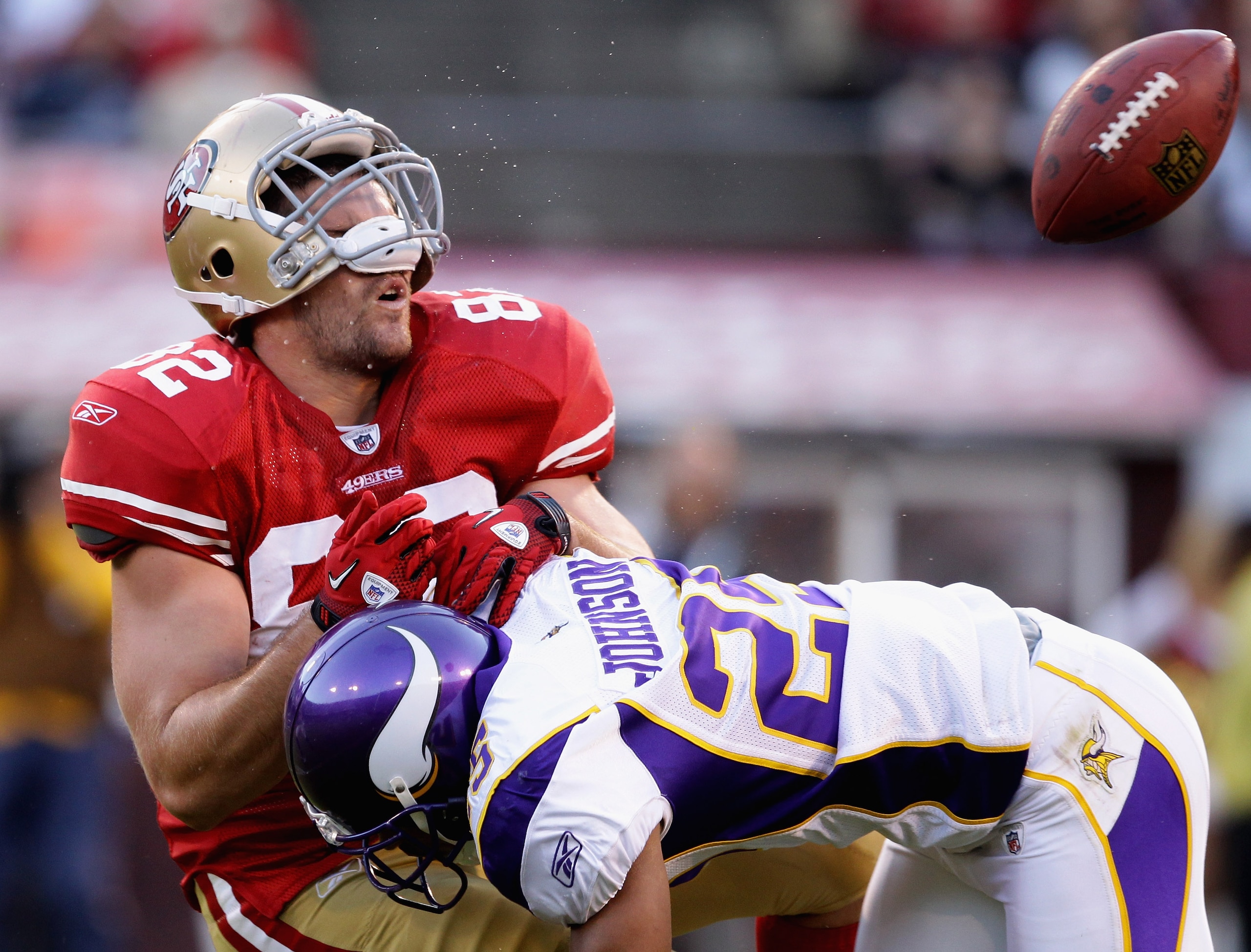 SAN FRANCISCO - AUGUST 22:  Nate Byham #82 of the San Francisco 49ers is hit by Tyrell Johnson #25 of the Minnesota Vikings during a preseason game at Candlestick Park on August 22, 2010 in San Francisco, California.  (Photo by Ezra Shaw/Getty Images)