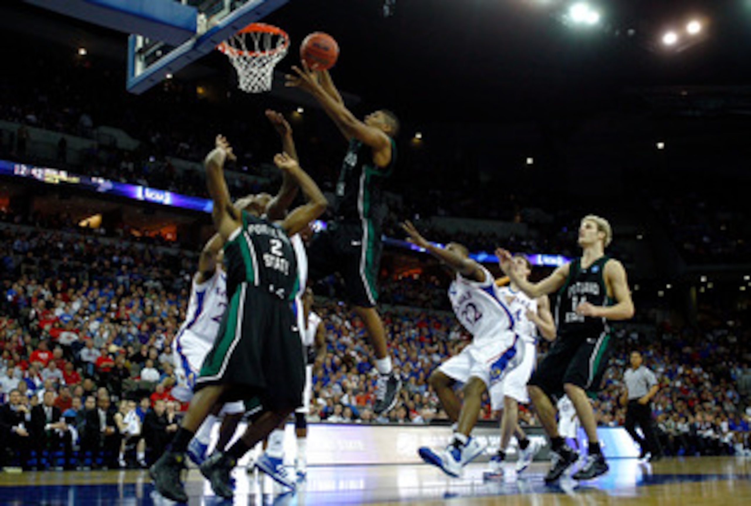 OMAHA, NE - MARCH 20:  Julius Thomas #1 of the Portland State Vikings goes up for a rebound against the Kansas Jayhawks during the Midwest Region first round of the 2008 NCAA Men's Basketball Tournament on March 20, 2008 at the Qwest Center in Omaha, Nebr