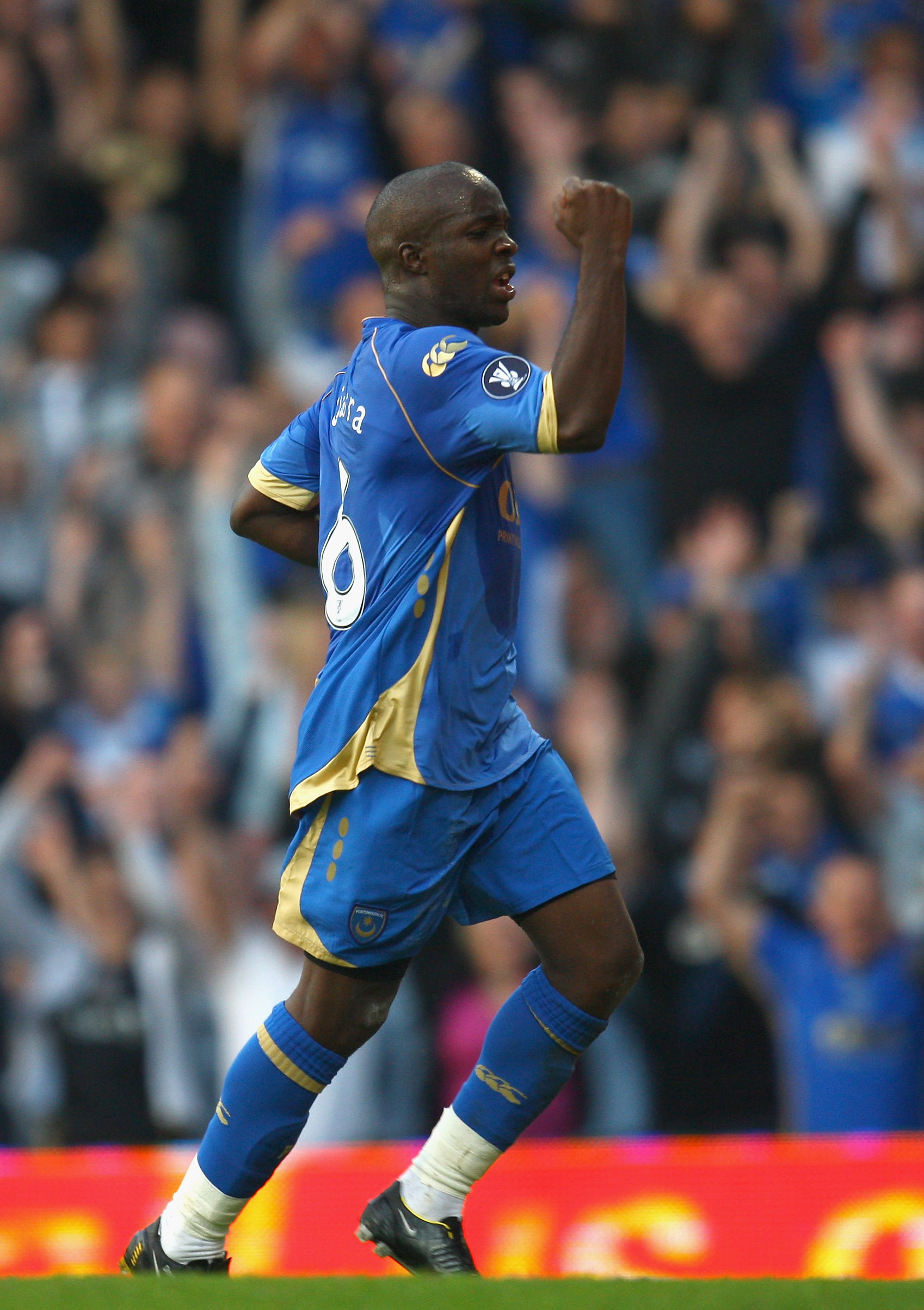 PORTSMOUTH, UNITED KINGDOM - SEPTEMBER 18:  Lassana Diarra of Portsmouth celebrates scoring the first goal for Portsmouth during the UEFA Cup round one first leg match between Portsmouth and Guimaraes at Fratton Park on September 18, 2008 in Portsmouth, E