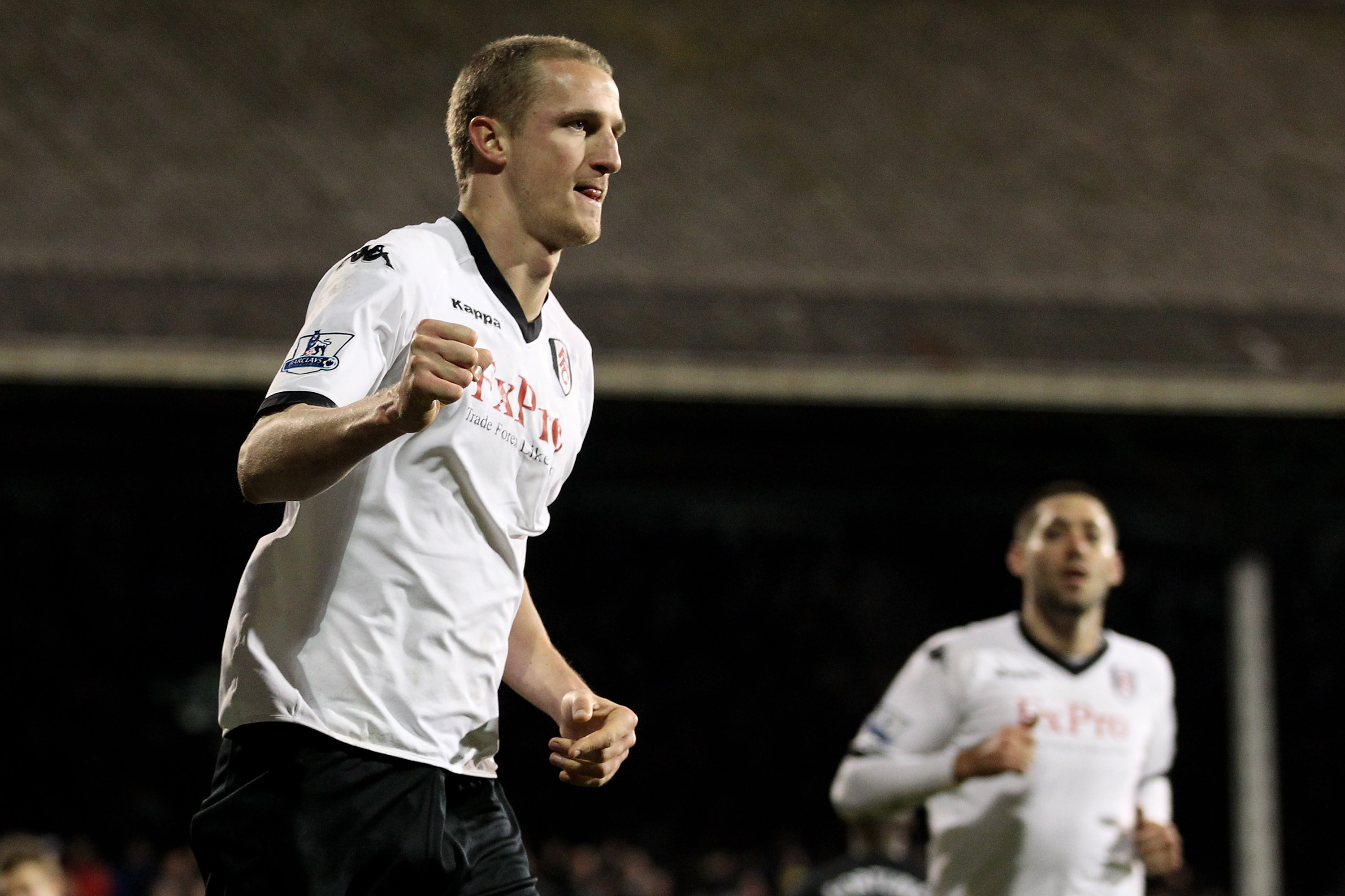LONDON, ENGLAND - JANUARY 04:  Brede Hangeland of Fulham celebrates after scoring their third goal during the Barclays Premier League match between Fulham and West Bromwich Albion at Craven Cottage on January 4, 2011 in London, England.  (Photo by Scott H