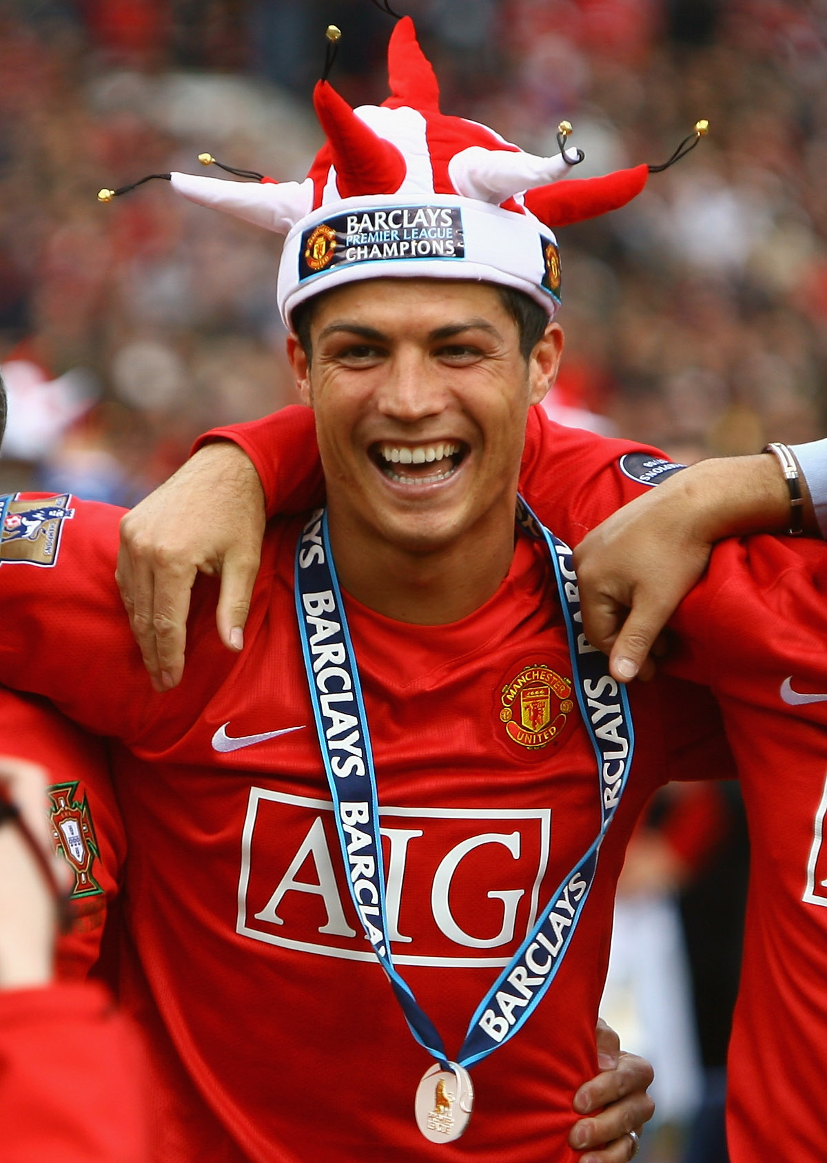 MANCHESTER, ENGLAND - MAY 16:  Cristiano Ronaldo of Manchester United celebrates winning the Barclays Premier League trophy after the Barclays Premier League match between Manchester United and Arsenal at Old Trafford on May 16, 2009 in Manchester, Englan