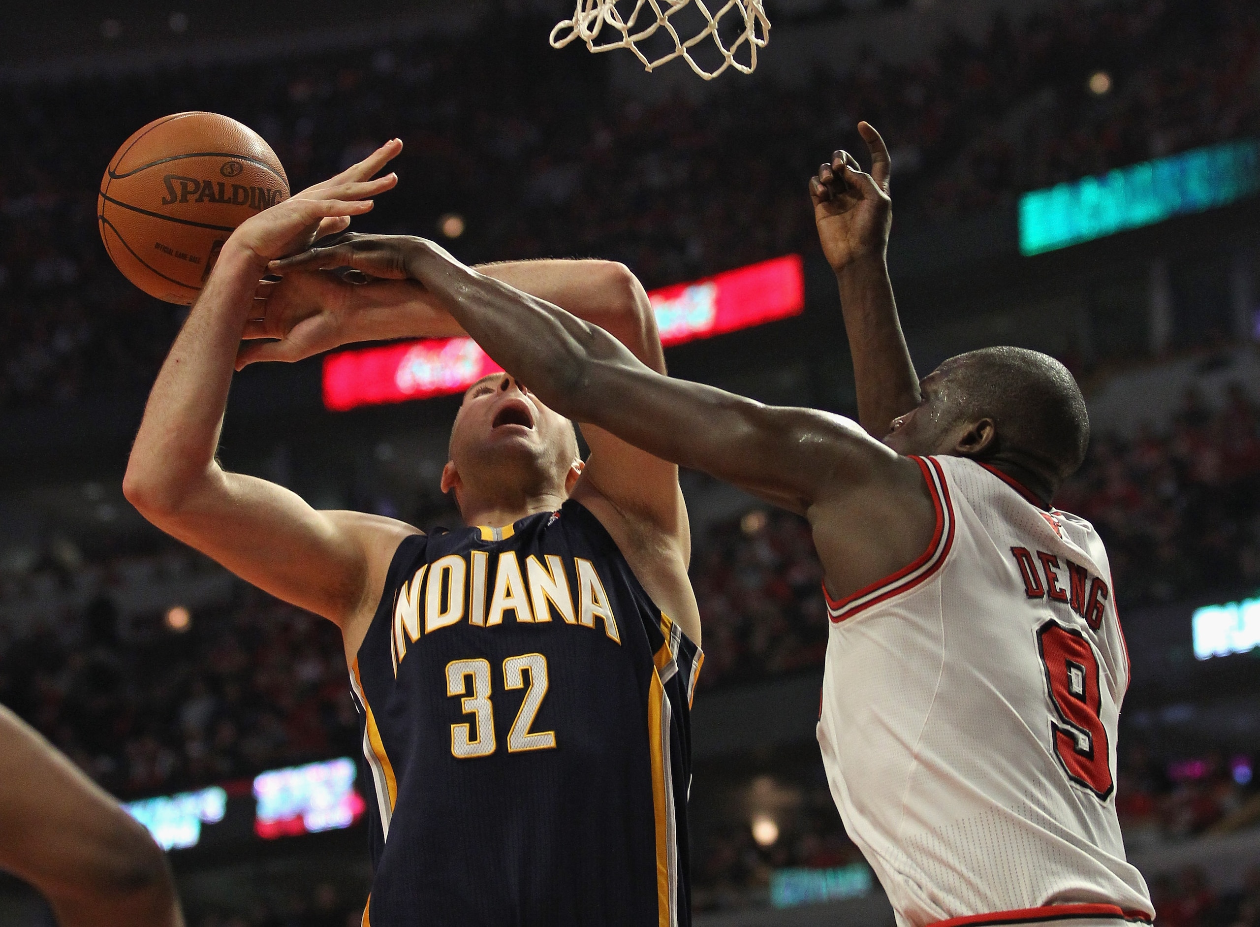 CHICAGO, IL - APRIL 16: Josh McRoberts #32 of the Indiana Pacers is fouled by Loul Deng #9 of the Chicago Bulls in Game One of the Eastern Conference Quarterfinals in the 2011 NBA Playoffs at the United Center on April 16, 2011 in Chicago, Illinois. NOTE CHICAGO, IL - APRIL 16: Josh McRoberts #32 of the Indiana Pacers is fouled by Loul Deng #9 of the Chicago Bulls in Game One of the Eastern Conference Quarterfinals in the 2011 NBA Playoffs at the United Center on April 16, 2011 in Chicago, Illinois. NOTE