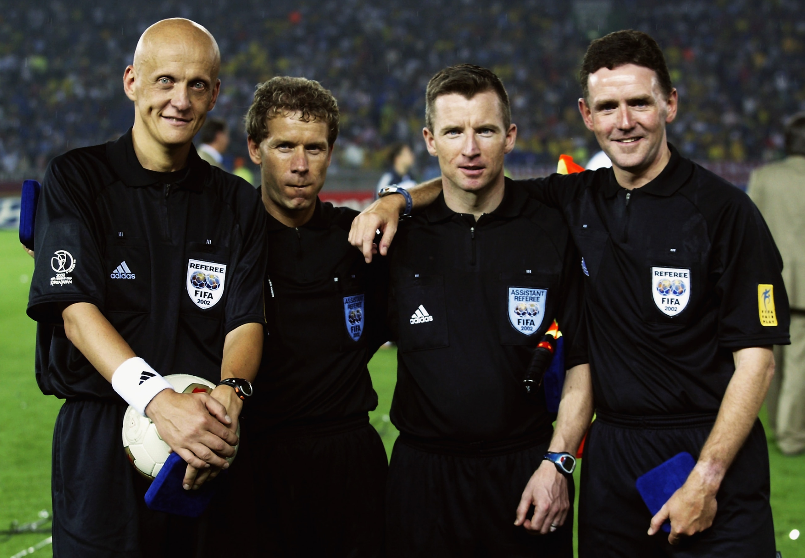 YOKOHAMA - JUNE 30:  Referee Pierluigi Collina, assistant referees Leif Lindberg and Phillip Sharp and fourth official Hugh Dallas before the Germany v Brazil, World Cup Final match played at the International Stadium Yokohama in Yokohama, Japan on June 3