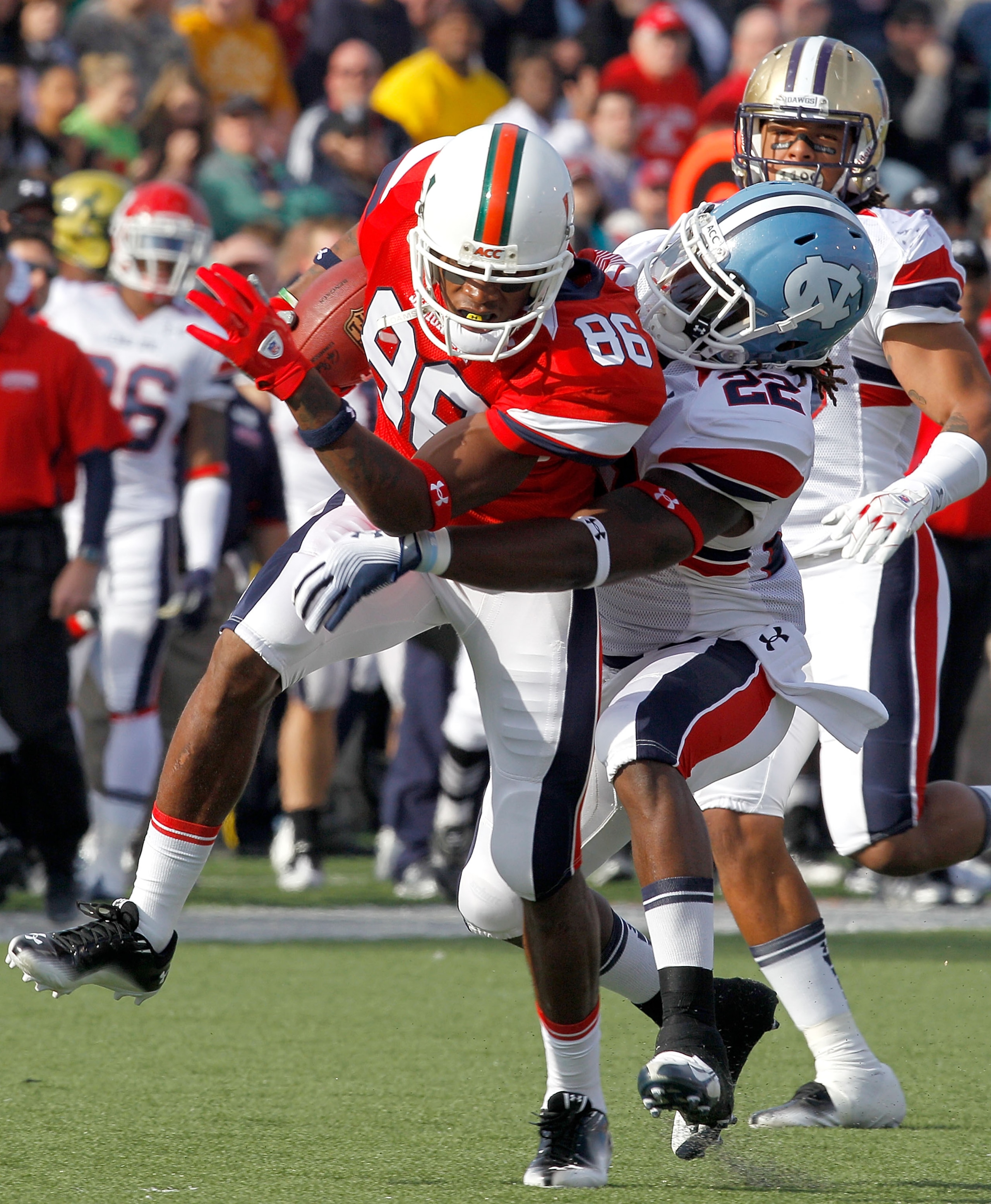 MOBILE, AL - JANUARY 29: Wide receiver Leonard Hankerson #86 of the South Team is tackled by Ryan Kerrigan #91 and Da'Norris Searcy #22 of the North Team during the fisrt quarter of the Under Armour Senior Bowl January 29, 2011 at Ladd Peebles Stadium in MOBILE, AL - JANUARY 29: Wide receiver Leonard Hankerson #86 of the South Team is tackled by Ryan Kerrigan #91 and Da'Norris Searcy #22 of the North Team during the fisrt quarter of the Under Armour Senior Bowl January 29, 2011 at Ladd Peebles Stadium in