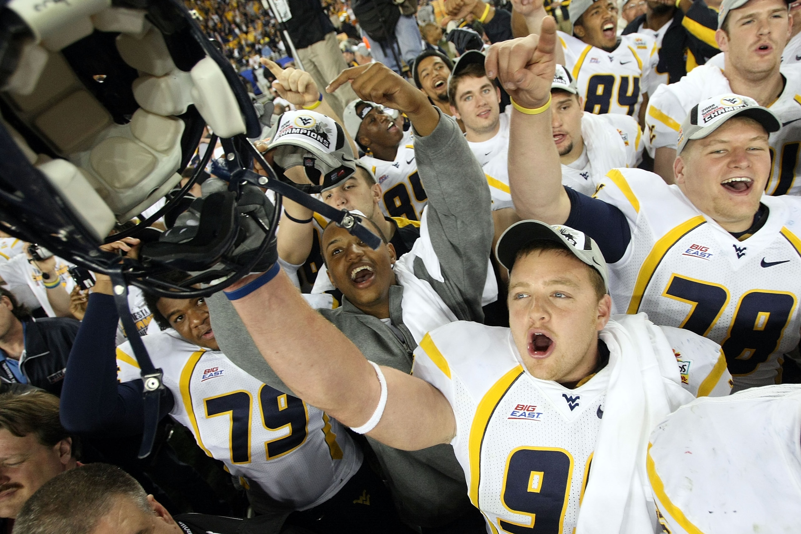 GLENDALE, AZ - JANUARY 02: Defensive lineman Chris Neild #90 of the West Virginia Mountaineers celebrates after the Mountaineers defeated the Oklahoma Sooners 48-28 after the Tostito's Fiesta Bowl at University of Phoenix Stadium January 2, 2008 in Glend GLENDALE, AZ - JANUARY 02: Defensive lineman Chris Neild #90 of the West Virginia Mountaineers celebrates after the Mountaineers defeated the Oklahoma Sooners 48-28 after the Tostito's Fiesta Bowl at University of Phoenix Stadium January 2, 2008 in Glend