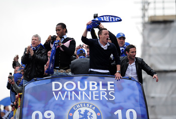 LONDON, ENGLAND - MAY 16:  Chelsea captain John Terry and Didier Drogba celebrate during the Chelsea FC Victory Parade on May 16, 2010 in London, England.  (Photo by Shaun Botterill/Getty Images)
