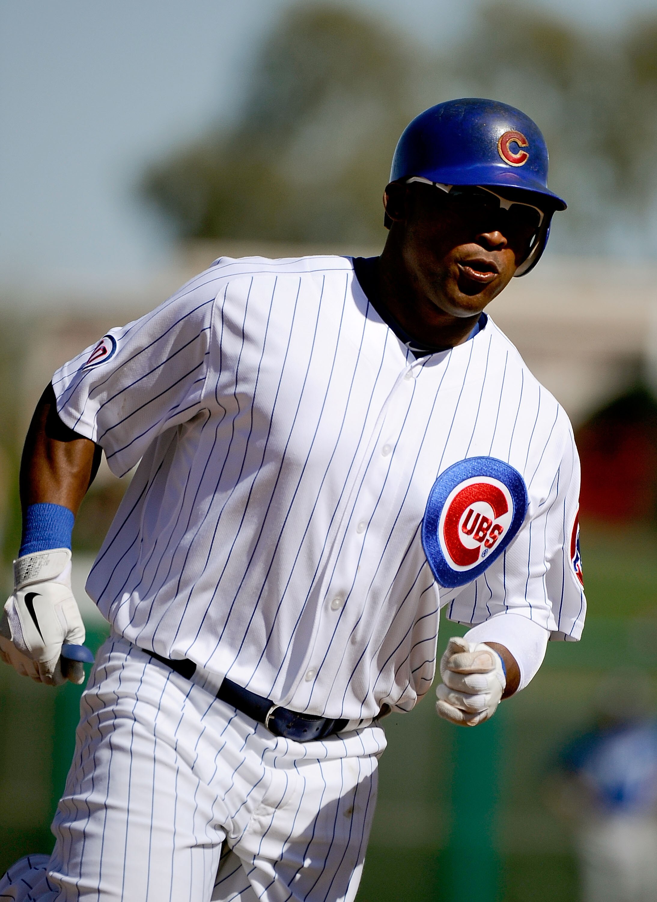 MESA, AZ - MARCH 09:  Marlon Byrd #24 of the Chicago Cubs runs the bases against the Kansas City Royals during the spring training baseball game at HoHoKam Stadium on March 9, 2011 in Mesa, Arizona.  (Photo by Kevork Djansezian/Getty Images)