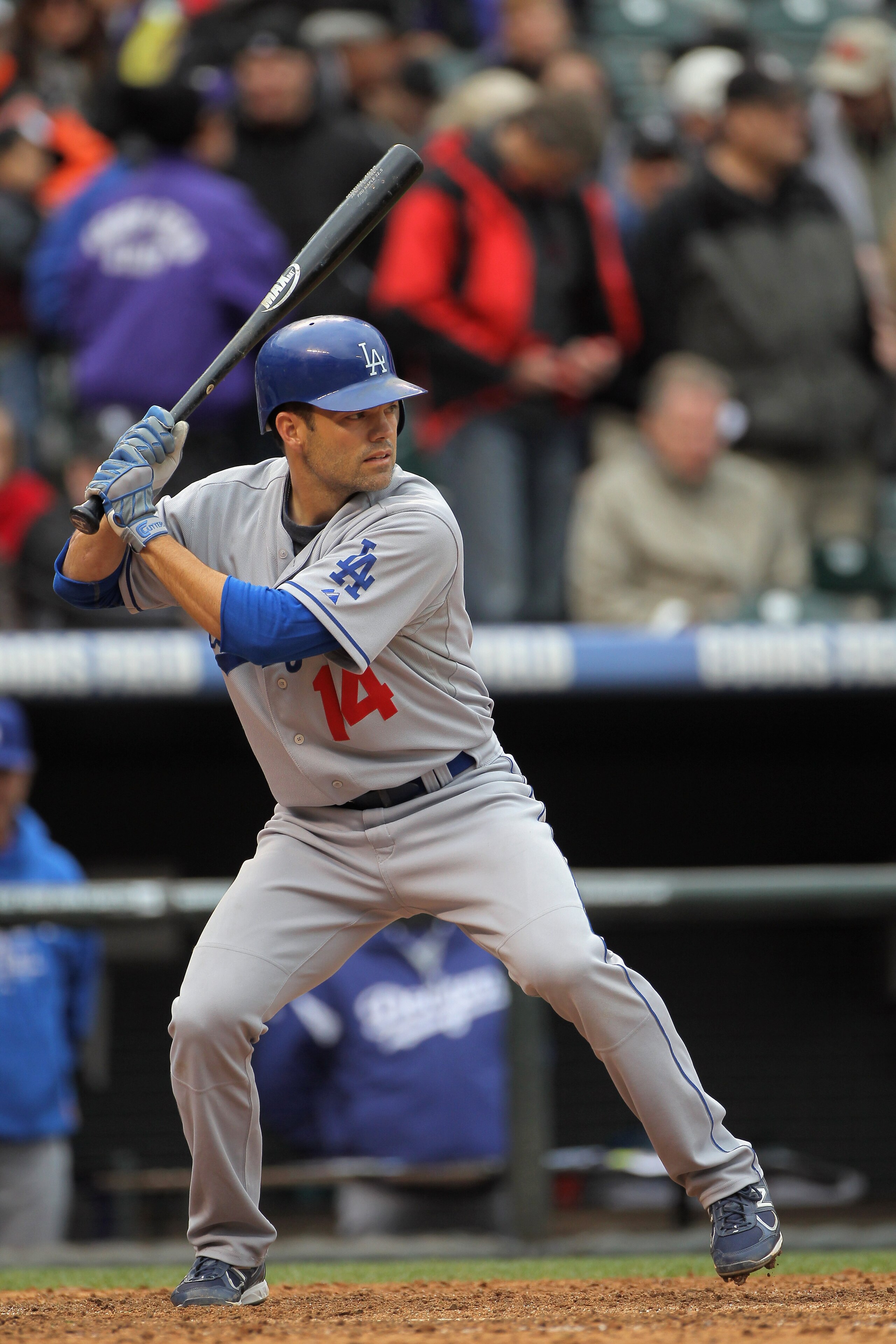 DENVER, CO - APRIL 06:  Jamey Carroll #14 of the Los Angeles Dodgers takes an at abt against the Colorado Rockies at Coors Field on April 6, 2011 in Denver, Colorado.  (Photo by Doug Pensinger/Getty Images)