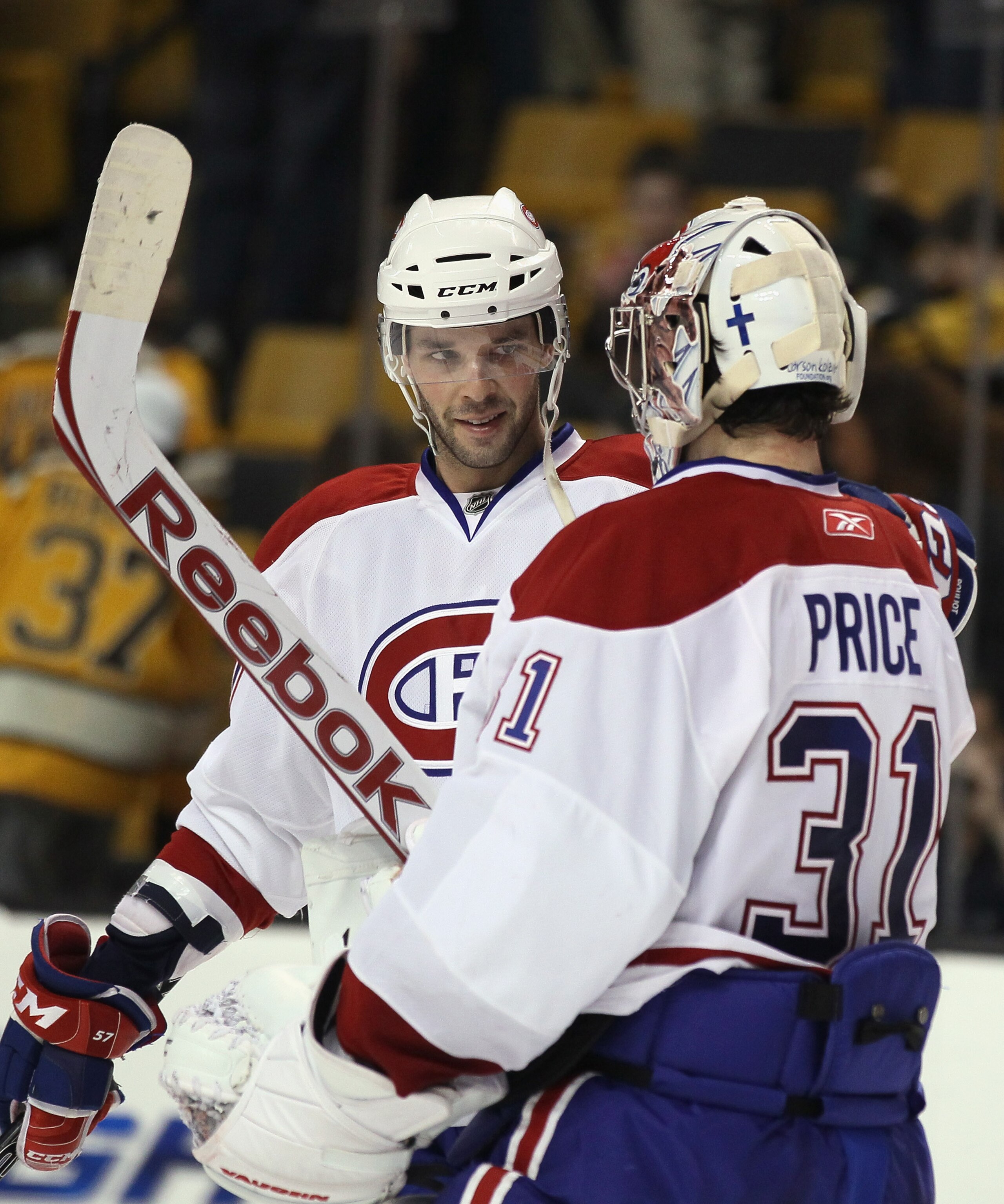BOSTON, MA - APRIL 14: Benoit Pouliot #57 of the Montreal Canadiens congratulates Carey Price #31 after Price shut out the Boston Bruins in Game One of the Eastern Conference Quarterfinals during the 2011 NHL Stanley Cup Playoffs at TD Garden on April 1 BOSTON, MA - APRIL 14: Benoit Pouliot #57 of the Montreal Canadiens congratulates Carey Price #31 after Price shut out the Boston Bruins in Game One of the Eastern Conference Quarterfinals during the 2011 NHL Stanley Cup Playoffs at TD Garden on April 1