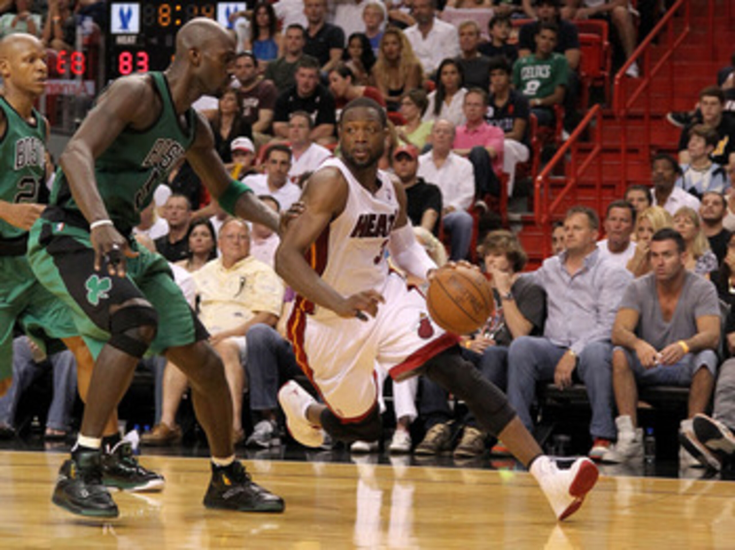 MIAMI, FL - APRIL 10: Dwyane Wade #3 of the Miami Heat drives on Kevin Garnett #5 of the Boston Celtics during a game at American Airlines Arena on April 10, 2011 in Miami, Florida. NOTE TO USER: User expressly acknowledges and agrees that, by downloadi MIAMI, FL - APRIL 10: Dwyane Wade #3 of the Miami Heat drives on Kevin Garnett #5 of the Boston Celtics during a game at American Airlines Arena on April 10, 2011 in Miami, Florida. NOTE TO USER: User expressly acknowledges and agrees that, by downloadi