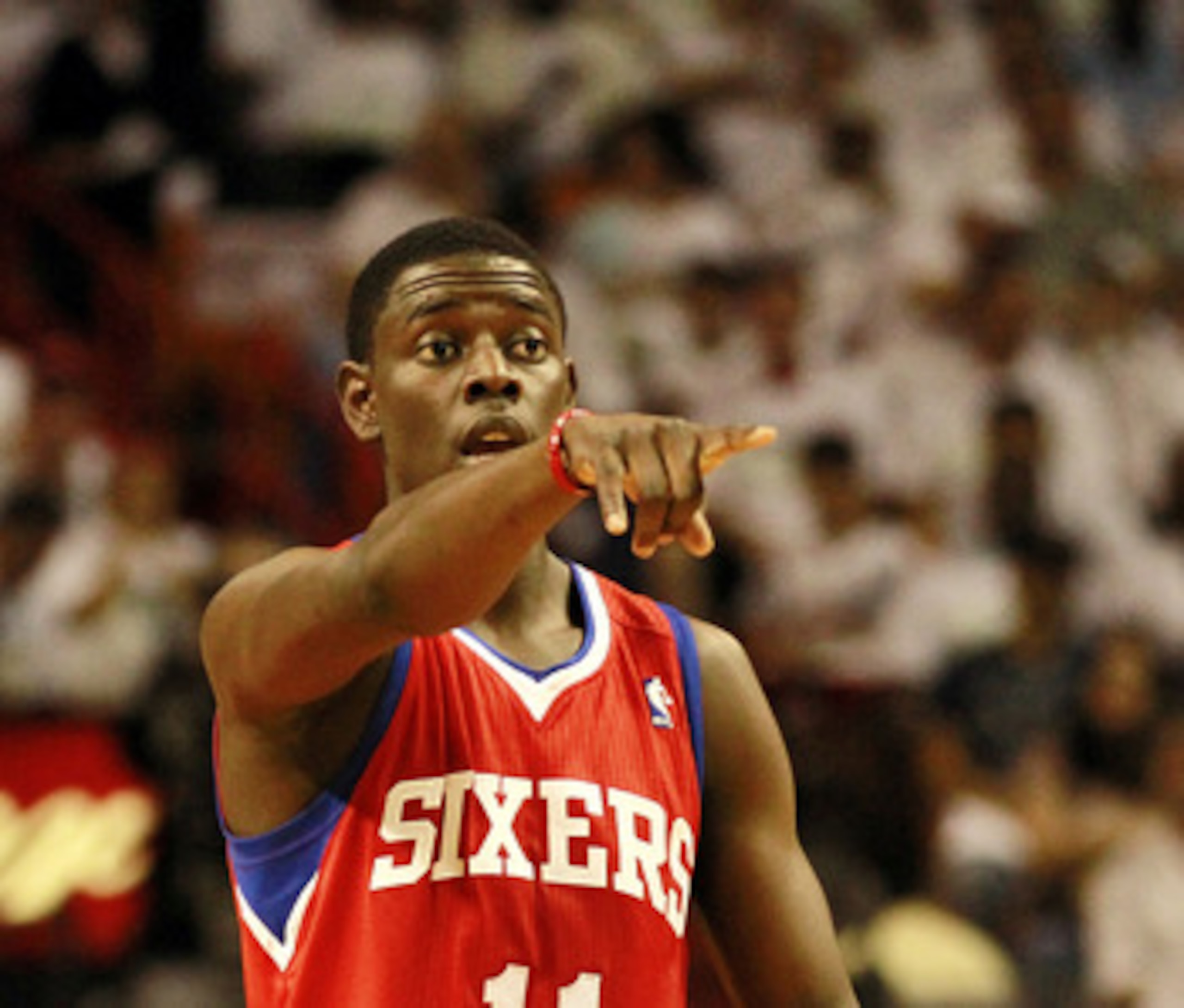 MIAMI, FL - APRIL 16: Guard Jrue Holiday #11 of the Philadelphia 76ers shouts during a game against the Maim Heat at the American Airlines Arena in game one of the Eastern Conference Quarterfinals in the 2011 NBA Playoffs on April 16, 2011 in Miami, Flori MIAMI, FL - APRIL 16: Guard Jrue Holiday #11 of the Philadelphia 76ers shouts during a game against the Maim Heat at the American Airlines Arena in game one of the Eastern Conference Quarterfinals in the 2011 NBA Playoffs on April 16, 2011 in Miami, Flori