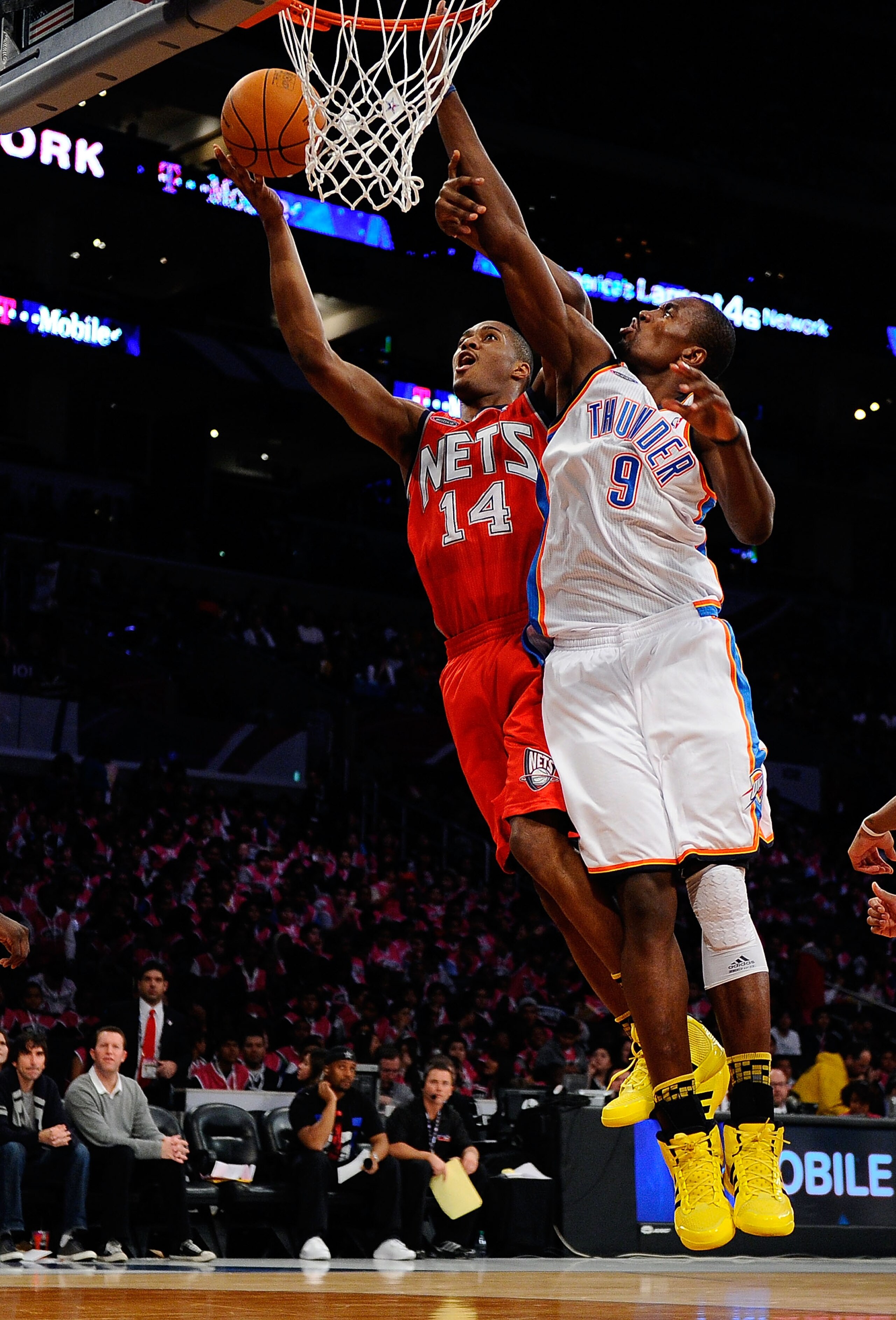 LOS ANGELES, CA - FEBRUARY 18: Derrick Favors #14 of the New Jersey Nets and the Rookie Team goes up for a shot against Serge Ibaka #9 of the Oklahoma City Thunder and the Sophomore Team in the second half during the T-Mobile Rookie Challenge and Youth J LOS ANGELES, CA - FEBRUARY 18: Derrick Favors #14 of the New Jersey Nets and the Rookie Team goes up for a shot against Serge Ibaka #9 of the Oklahoma City Thunder and the Sophomore Team in the second half during the T-Mobile Rookie Challenge and Youth J