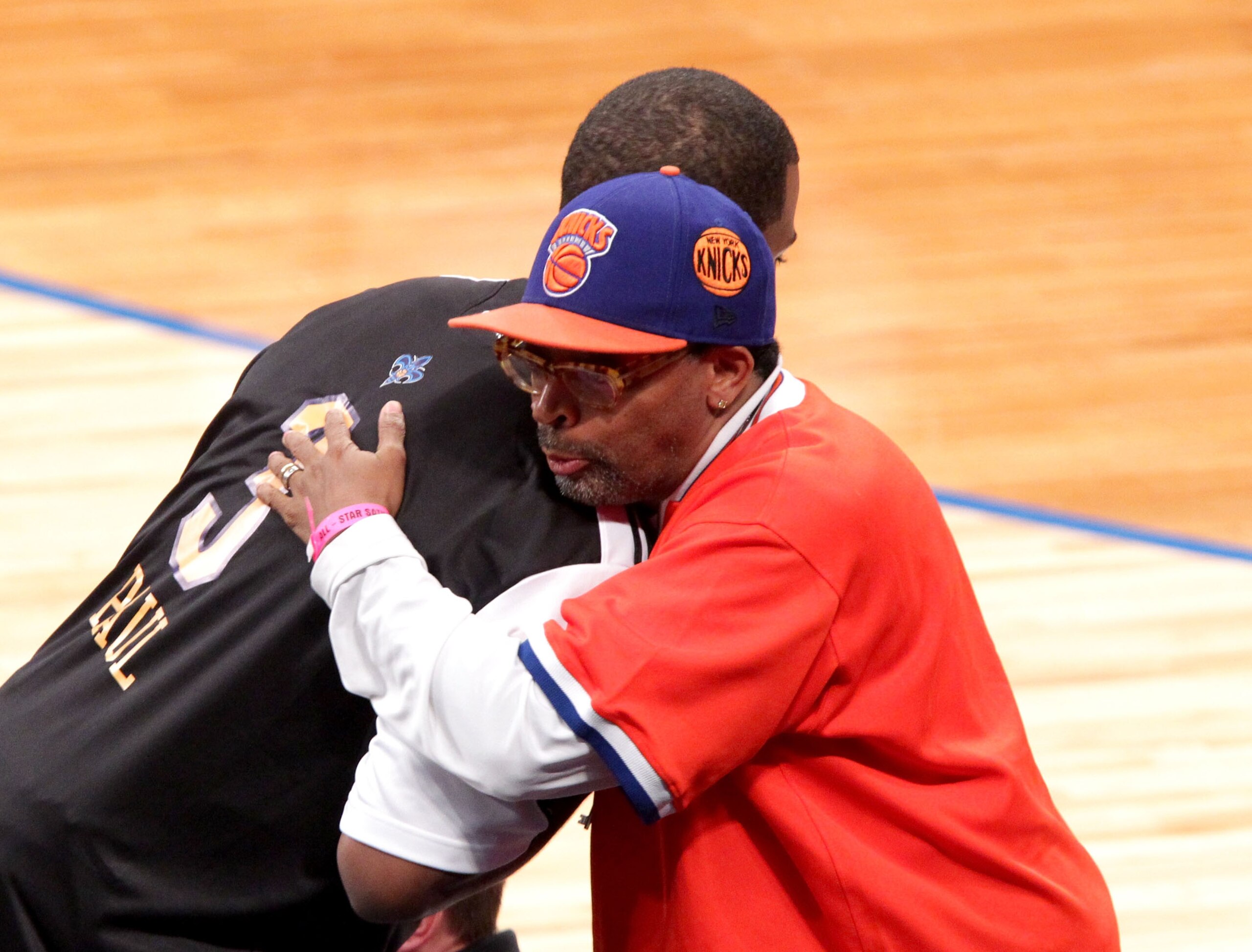 LOS ANGELES, CA - FEBRUARY 19: NBA player for the New Orleans Hornets (L) and director Spike Lee hug during NBA All-Star Saturday night presented by State Farm at Staples Center on February 19, 2011 in Los Angeles, California. (Photo by Noel Vasquez/Get LOS ANGELES, CA - FEBRUARY 19: NBA player for the New Orleans Hornets (L) and director Spike Lee hug during NBA All-Star Saturday night presented by State Farm at Staples Center on February 19, 2011 in Los Angeles, California. (Photo by Noel Vasquez/Get