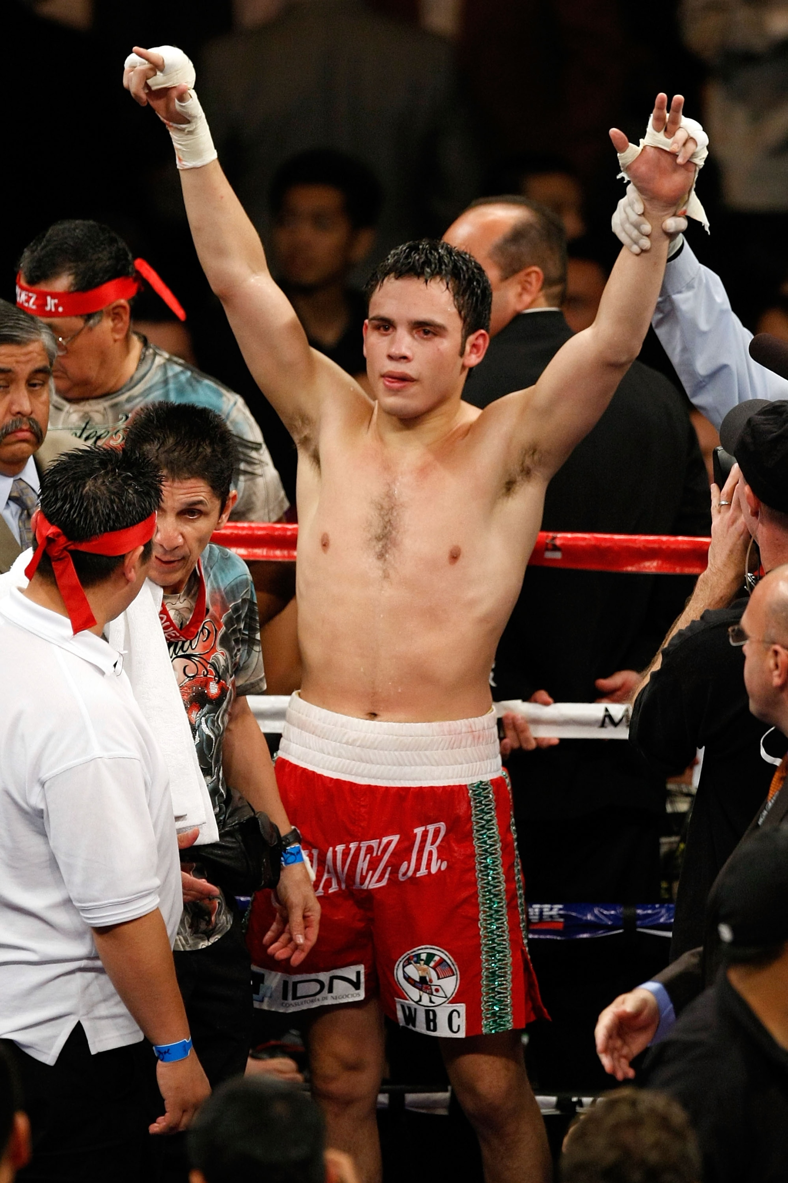 LAS VEGAS - NOVEMBER 14:  Julio Cesar Chavez Jr. of Mexico celebrates after defeating Troy Rowland by unanimous decision during their middleweight fight at the MGM Grand Garden Arena on November 14, 2009 in Las Vegas, Nevada.  (Photo by Ethan Miller/Getty