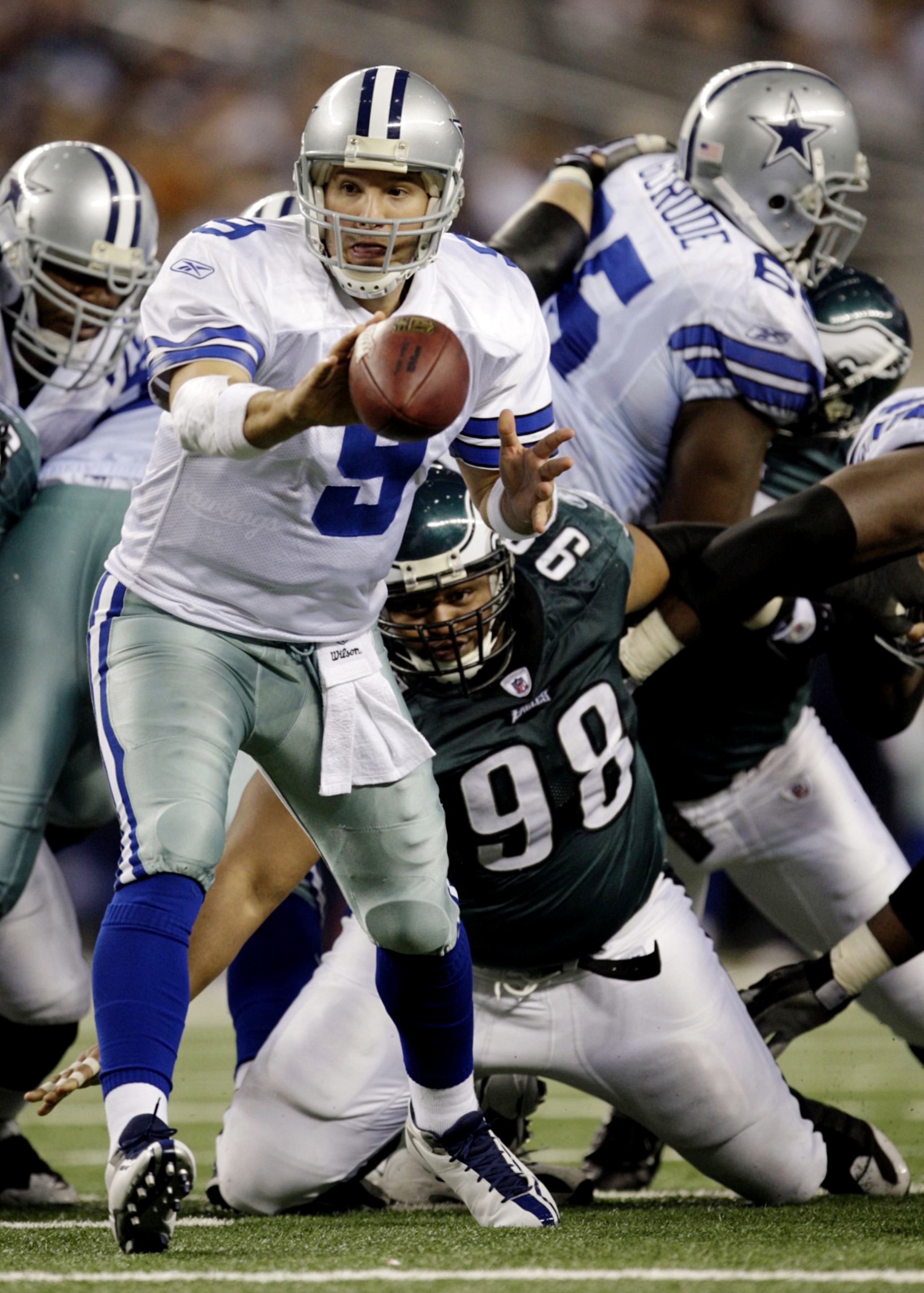 ARLINGTON, TX - JANUARY 9: Tony Romo #9 of the Dallas Cowboys pitches the ball in the fourth quarter against the Philadelphia Eagles during the 2010 NFC wild-card playoff game at Cowboys Stadium on January 9, 2010 in Arlington, Texas. (Photo by Jamie Squ ARLINGTON, TX - JANUARY 9: Tony Romo #9 of the Dallas Cowboys pitches the ball in the fourth quarter against the Philadelphia Eagles during the 2010 NFC wild-card playoff game at Cowboys Stadium on January 9, 2010 in Arlington, Texas. (Photo by Jamie Squ