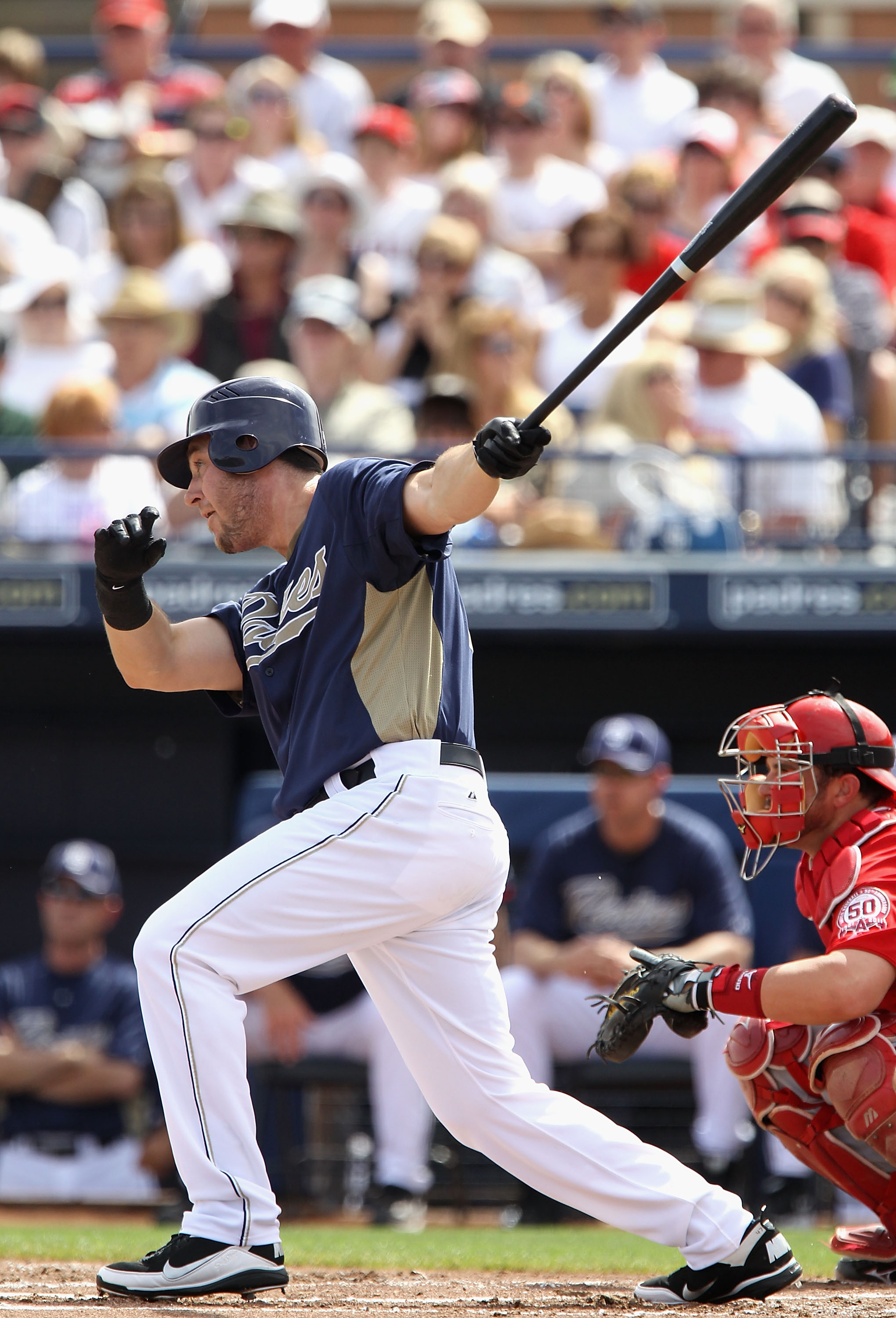 PEORIA, AZ - MARCH 15:  Ryan Ludwick #47 of the San Diego Padres hits a single against the Los Angeles Angels of Anaheim during the first inning of the spring training game at Peoria Stadium on March 15, 2011 in Peoria, Arizona.  (Photo by Christian Peter