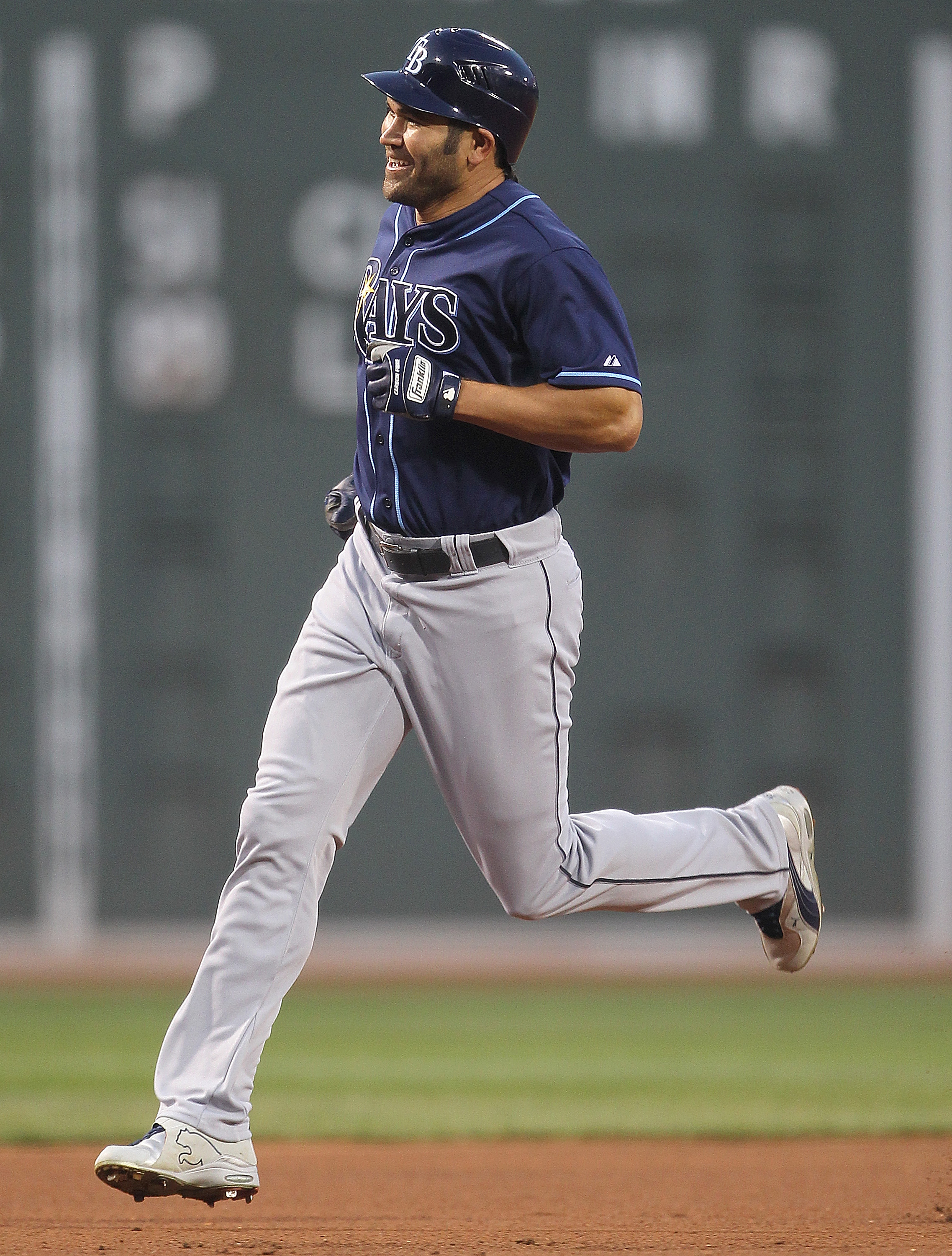 BOSTON, MA - APRIL 11:  Johnny Damon #22 of the Tampa Bay Rays rounds the bases after hitting a home run in the first inning against the Boston Red Sox at Fenway Park April 11, 2011 in Boston, Massachusetts. (Photo by Jim Rogash/Getty Images)