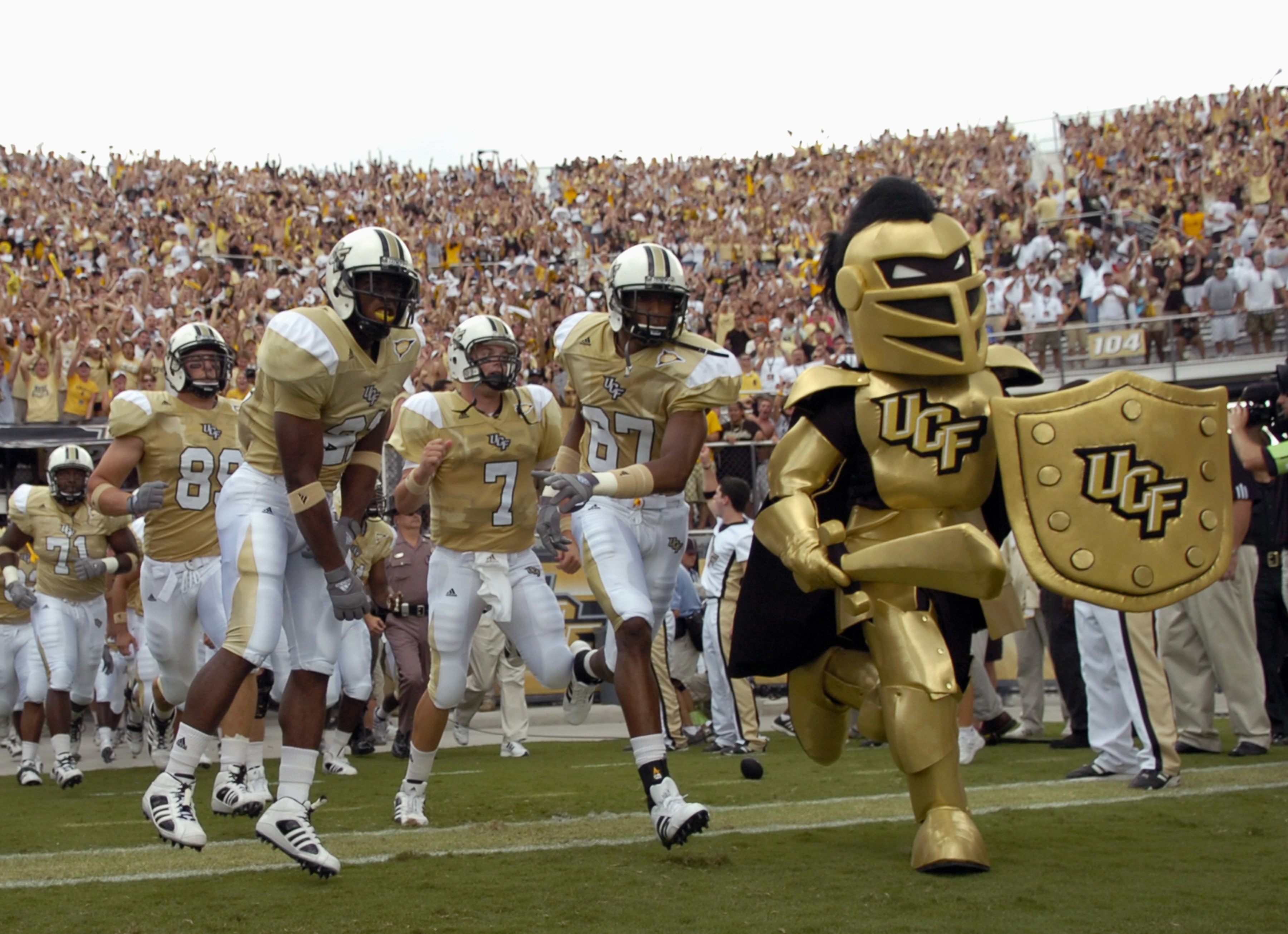 ORLANDO, FL - SEPTEMBER 15: The University of Central Florida Knights are led onto the field by their mascot before play against the Texas Longhorns during the first game at the new Bright House Networks Stadium on September 15, 2007 in Orlando, Florida.