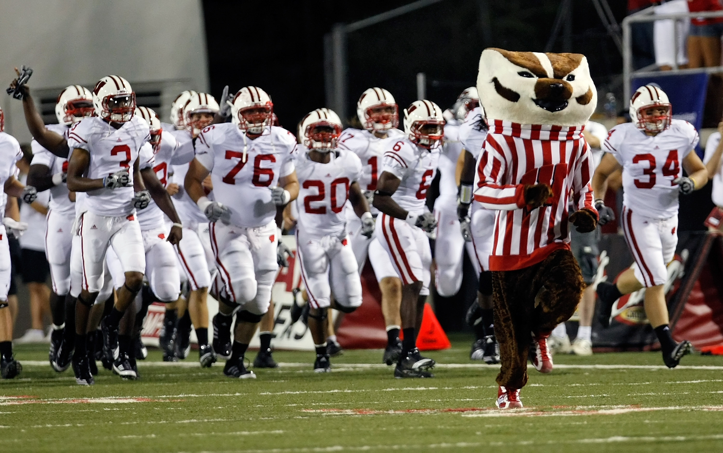 LAS VEGAS - SEPTEMBER 04:  The Wisconsin Badgers, including mascot Bucky Badger, take the field for their game against the UNLV Rebels at Sam Boyd Stadium September 4, 2010 in Las Vegas, Nevada. Wisconsin won 41-21.  (Photo by Ethan Miller/Getty Images)