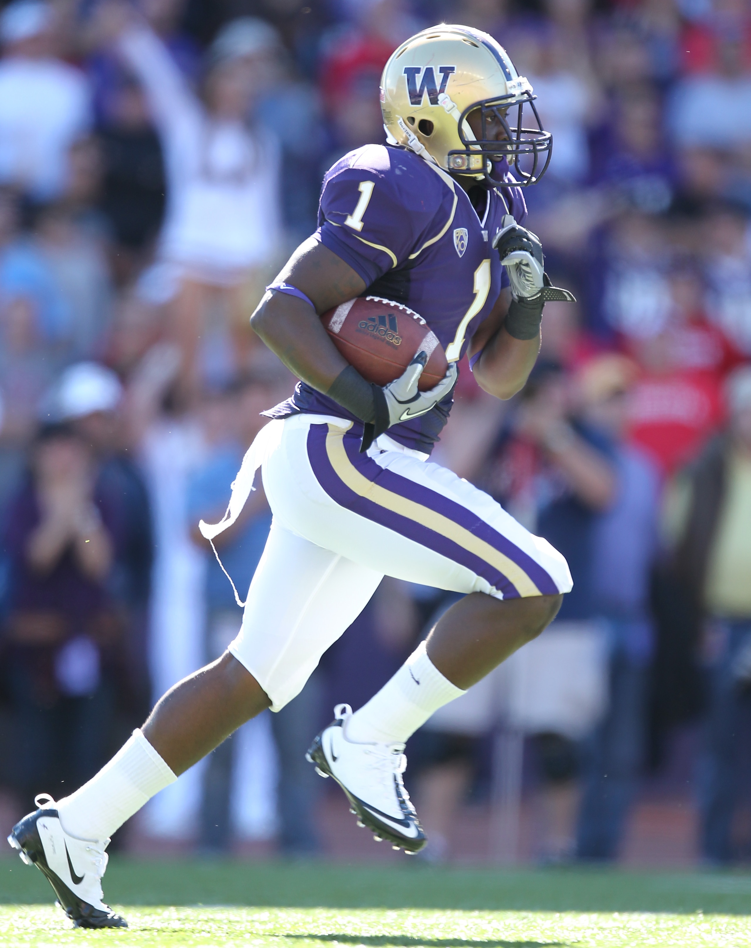 SEATTLE - SEPTEMBER 18: Kick returner Sean Parker #1 of the Washington Huskies rushes against the Nebraska Cornhuskers on September 18, 2010 at Husky Stadium in Seattle, Washington. (Photo by Otto Greule Jr/Getty Images)