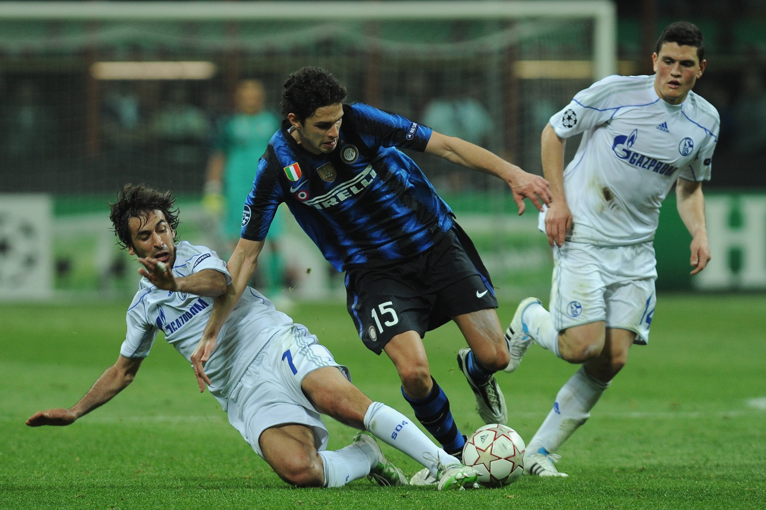 MILAN, ITALY - APRIL 05: Andrea Ranocchia of FC Internazionale Milano is challenged by Raul (L) of Schalke 04 during the UEFA Champions League Quarter Final match between FC Internazionale Milano and Schalke 04 at San Siro Stadium on April 5, 2011 in Mil MILAN, ITALY - APRIL 05: Andrea Ranocchia of FC Internazionale Milano is challenged by Raul (L) of Schalke 04 during the UEFA Champions League Quarter Final match between FC Internazionale Milano and Schalke 04 at San Siro Stadium on April 5, 2011 in Mil