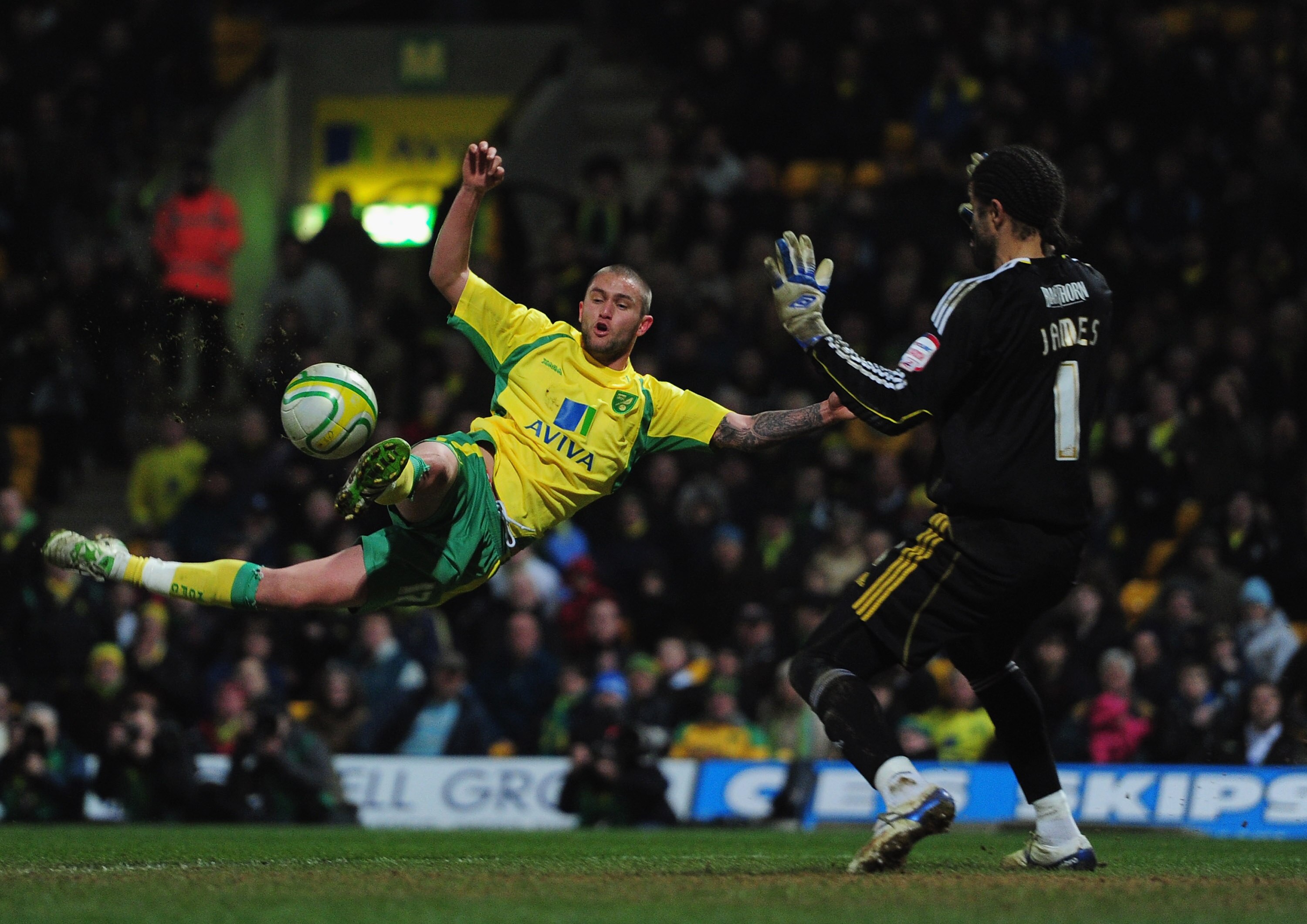 NORWICH, ENGLAND - MARCH 14:  Henri Lansbury of Norwich scores a goal during the npower Chapionship match between Norwich City and Bristol City at Carrow Road on March 14, 2011 in Norwich, England.  (Photo by Jamie McDonald/Getty Images)