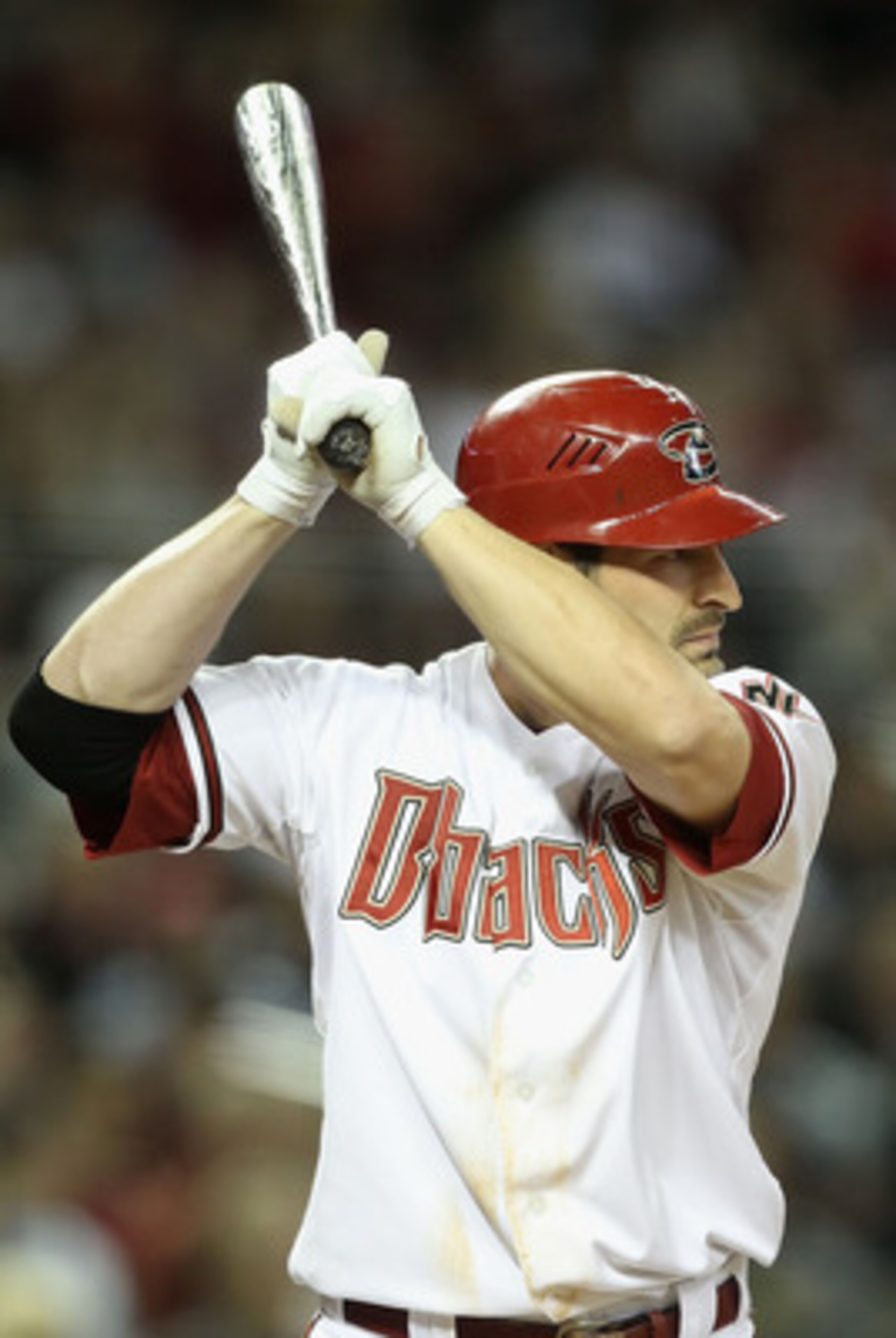 PHOENIX, AZ - APRIL 08: Xavier Nady #22 of the Arizona Diamondbacks bats against the Cincinnati Reds during the Major League Baseball home opening game at Chase Field on April 8, 2011 in Phoenix, Arizona. The Diamondbacks defeated the Reds 13-2. (Photo PHOENIX, AZ - APRIL 08: Xavier Nady #22 of the Arizona Diamondbacks bats against the Cincinnati Reds during the Major League Baseball home opening game at Chase Field on April 8, 2011 in Phoenix, Arizona. The Diamondbacks defeated the Reds 13-2. (Photo