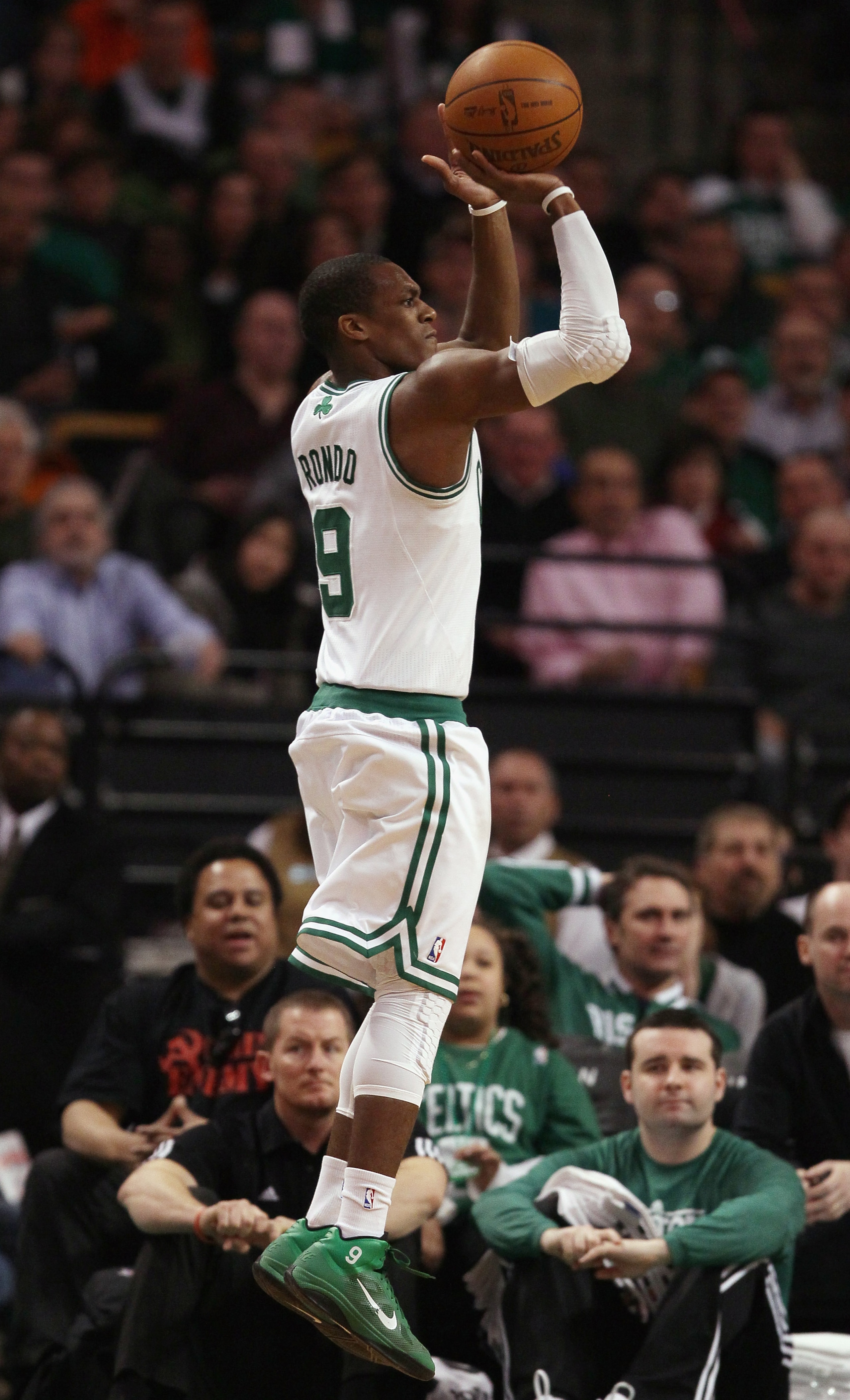BOSTON, MA - MARCH 02: Rajon Rondo #9 of the Boston Celtics takes a shot in the second half against the Phoenix Suns on March 2, 2011 at the TD Garden in Boston, Massachusetts. The Celtics defeated the Suns 115-103. NOTE TO USER: User expressly acknowle BOSTON, MA - MARCH 02: Rajon Rondo #9 of the Boston Celtics takes a shot in the second half against the Phoenix Suns on March 2, 2011 at the TD Garden in Boston, Massachusetts. The Celtics defeated the Suns 115-103. NOTE TO USER: User expressly acknowle
