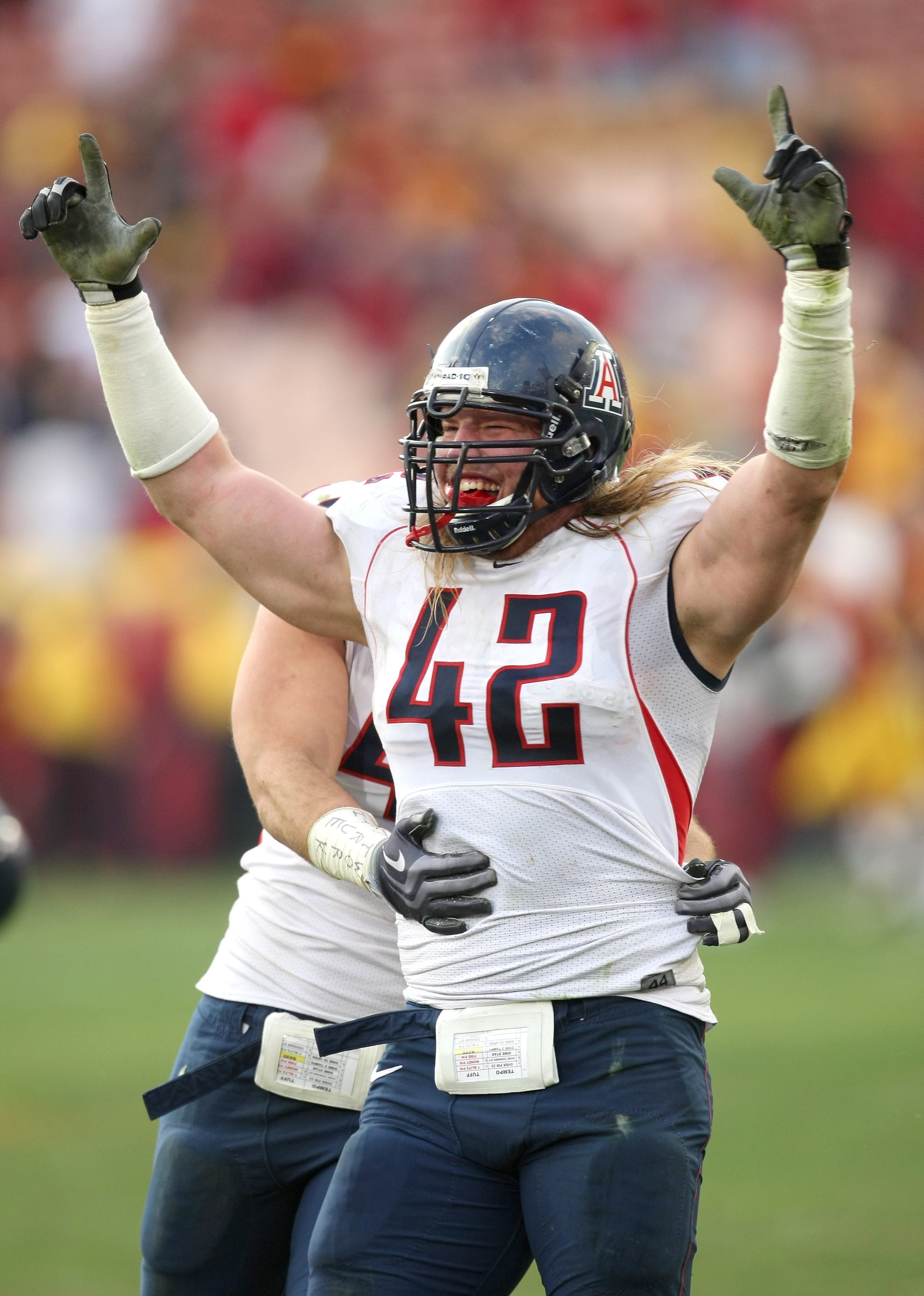 LOS ANGELES, CA - DECEMBER 05:  Defensive end Brooks Reed #42 of the Arizona Wildcats celebrates after stopping the USC Trojans on the final play on December 5, 2009 at the Los Angeles Coliseum in Los Angeles, California. Arizona won 21-17.  (Photo by Ste