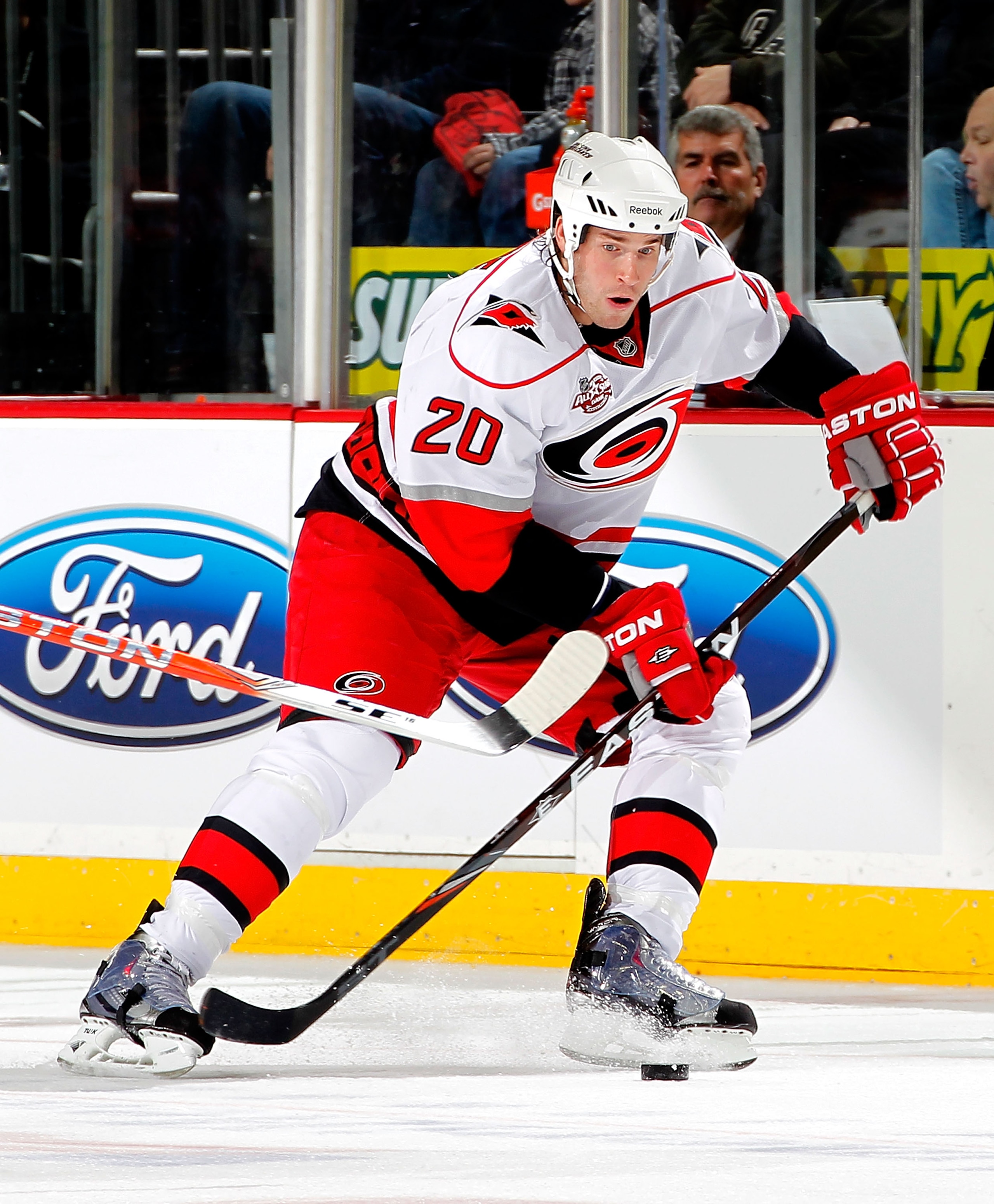 NEWARK, NJ - FEBRUARY 08:  Troy Bodie #20 of the Carolina Hurricanes skates during an NHL hockey game against the New Jersey Devils at the Prudential Center on February 8, 2011 in Newark, New Jersey.  (Photo by Paul Bereswill/Getty Images)
