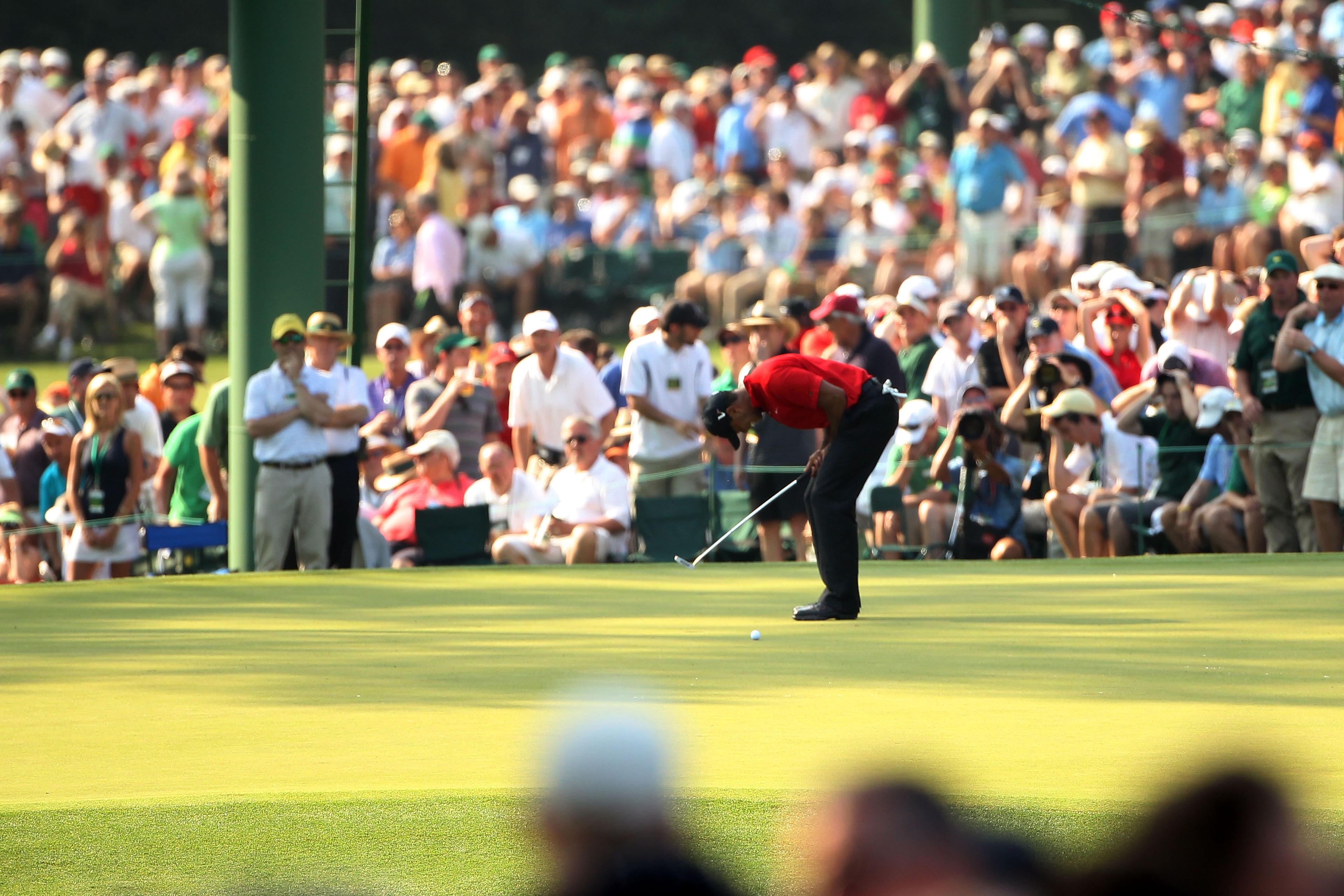 AUGUSTA, GA - APRIL 10: Tiger Woods reacts to a missed eagle putt on the 15th hole during the final round of the 2011 Masters Tournament at Augusta National Golf Club on April 10, 2011 in Augusta, Georgia. (Photo by Andrew Redington/Getty Images) AUGUSTA, GA - APRIL 10: Tiger Woods reacts to a missed eagle putt on the 15th hole during the final round of the 2011 Masters Tournament at Augusta National Golf Club on April 10, 2011 in Augusta, Georgia. (Photo by Andrew Redington/Getty Images)