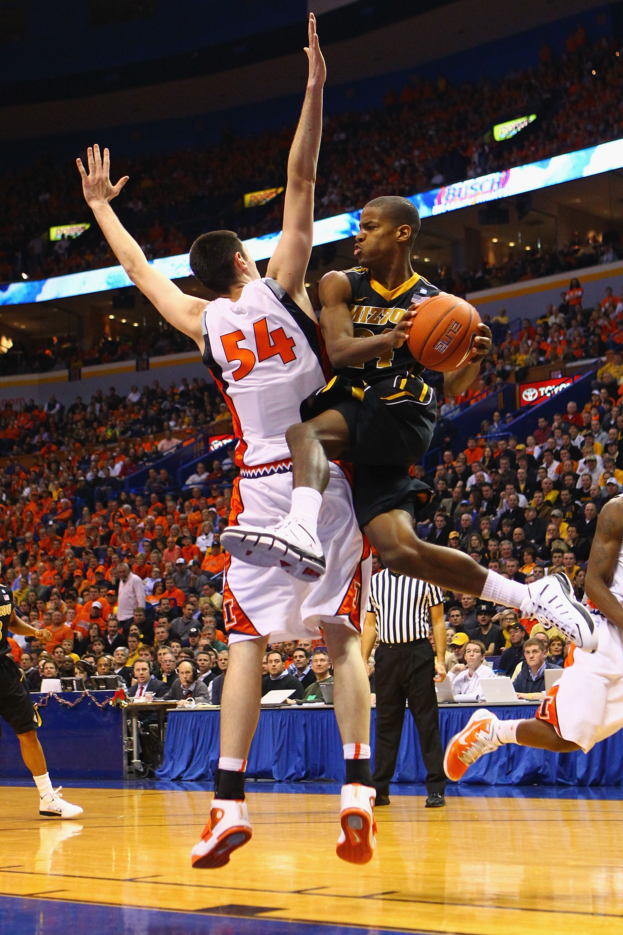 ST. LOUIS, MO - DECEMBER 22: Kim English #24 of the Missouri Tigers looks to shoot the ball against the Illinois Fighting Illini during the Busch Braggin' Rights game at the Scottrade Center on December 22, 2010 in St. Louis, Missouri. The Tigers beat th