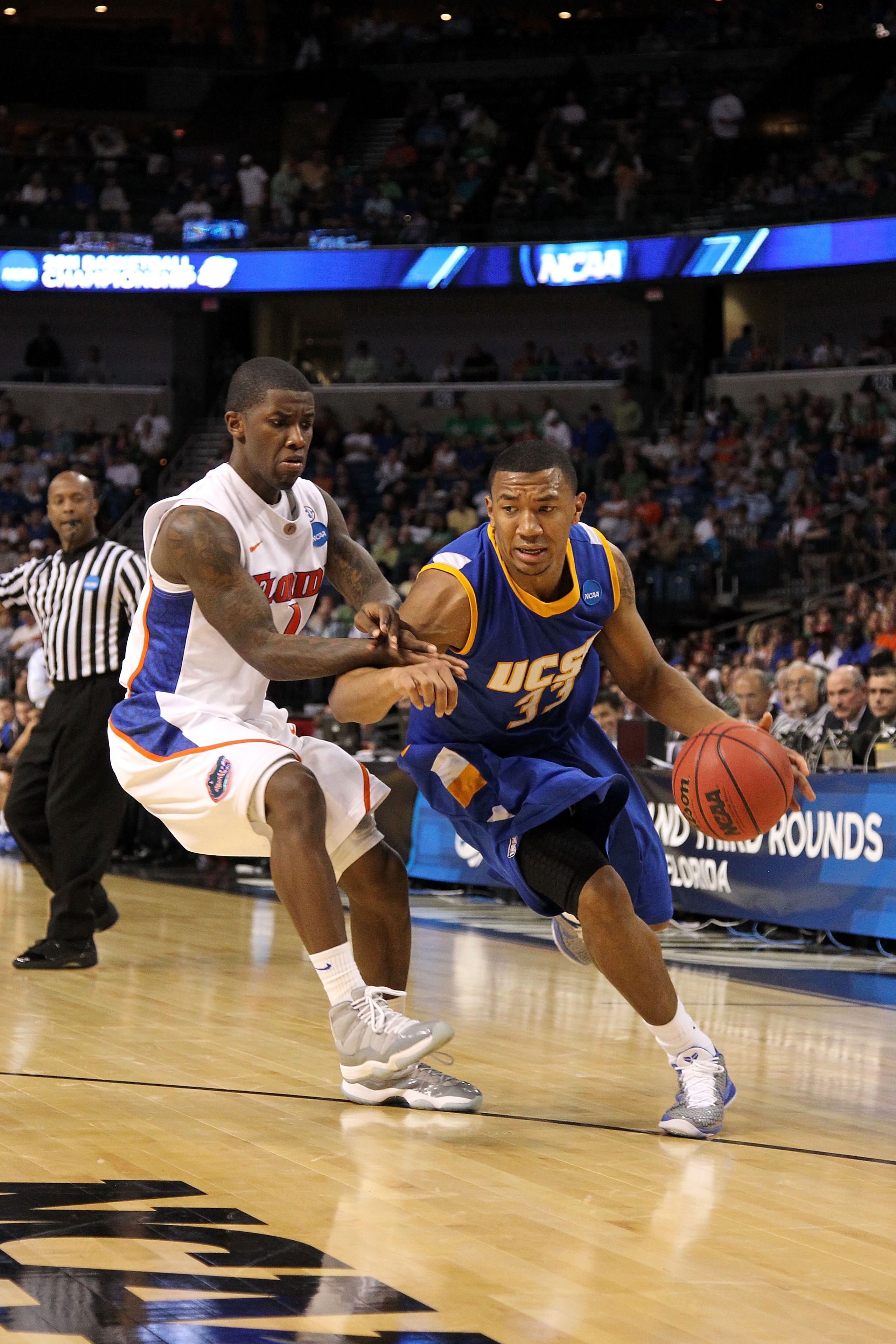 TAMPA, FL - MARCH 17:  Orlando Johnson #33 of the UC Santa Barbara Gauchos drives against the Florida Gators during the second round of the 2011 NCAA men's basketball tournament at St. Pete Times Forum on March 17, 2011 in Tampa, Florida. Florida won 79-5