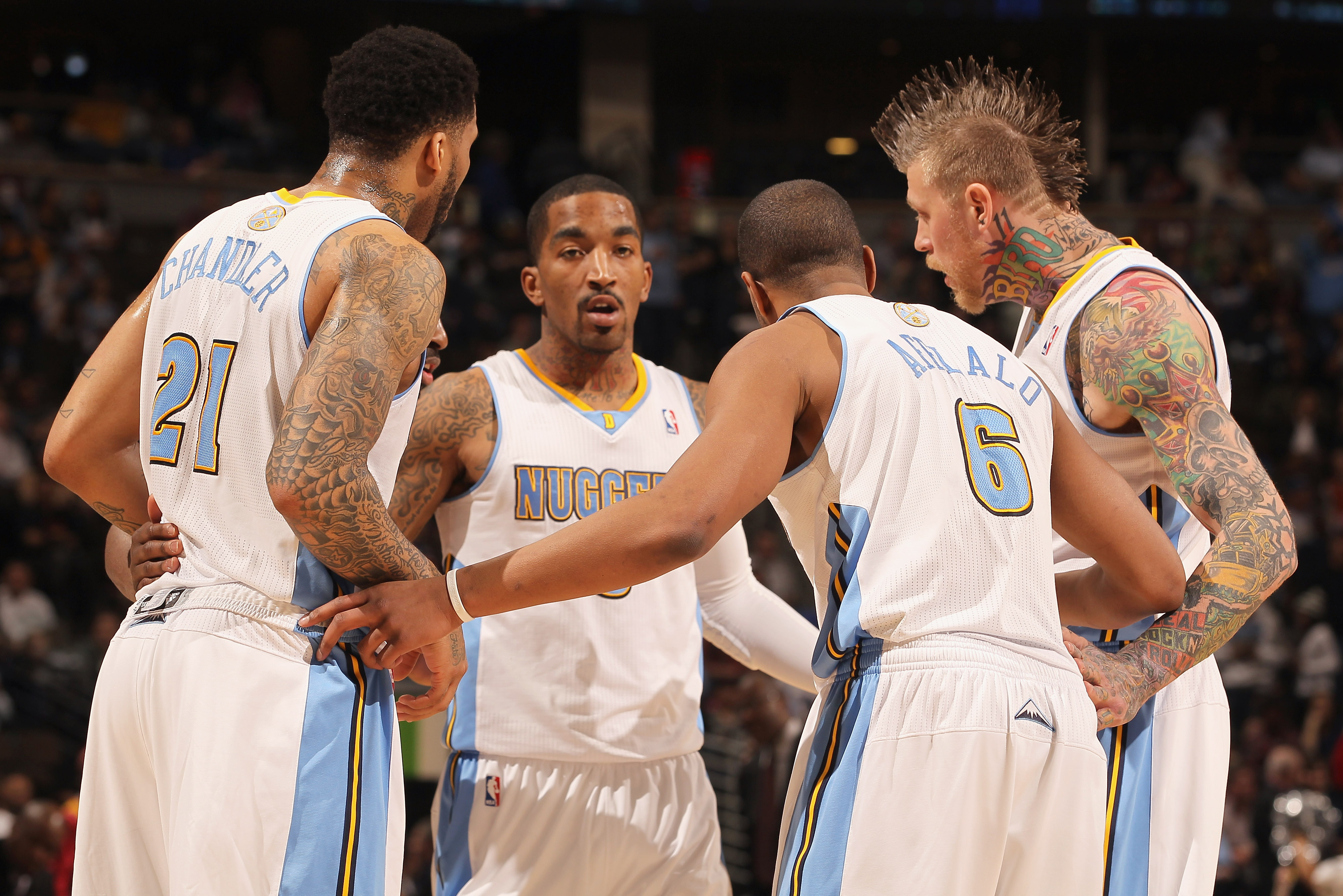 DENVER, CO - FEBRUARY 28:  (L-R) Wilson Chandler #21, Raymond Felton #20 (hidden), J.R. Smith #5, Arron Afflalo #6 and Chris Andersen #11 of the Denver Nuggets huddle up against the Atlanta Hawks during NBA action at the Pepsi Center on February 28, 2011