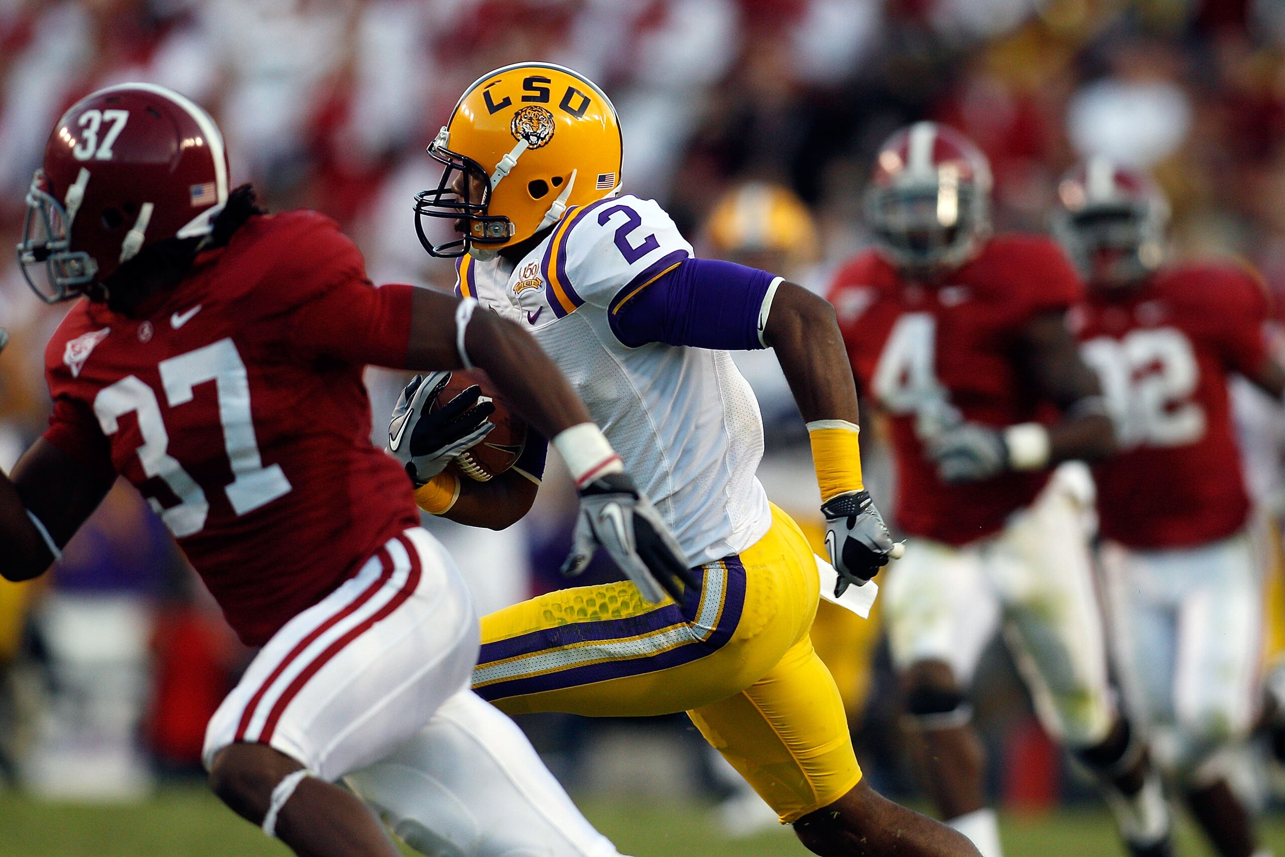 BATON ROUGE, LA - NOVEMBER 06:  Rueben Randle #2 of the Louisiana State University Tigers runs for a first down against the Alabama Crimson Tide at Tiger Stadium on November 6, 2010 in Baton Rouge, Louisiana. The Tigers defeated the Crimson Tide 24-21.  (