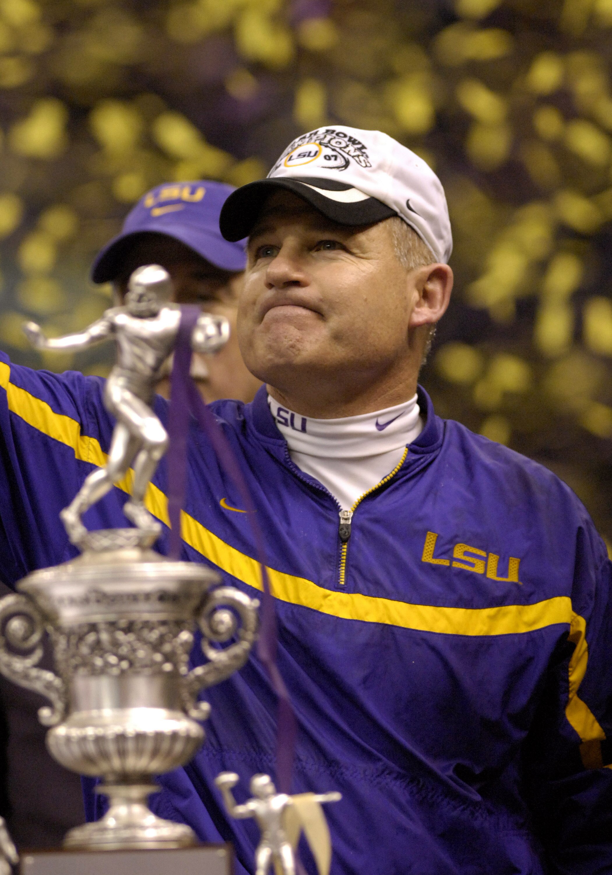 LSU coach Les Miles with the championship trophy after a win against Notre Dame in the Allstate Sugar Bowl at the Superdome in New Orleans, Louisiana on January 3, 2007.  LSU won 41 - 14. (Photo by A. Messerschmidt/Getty Images)