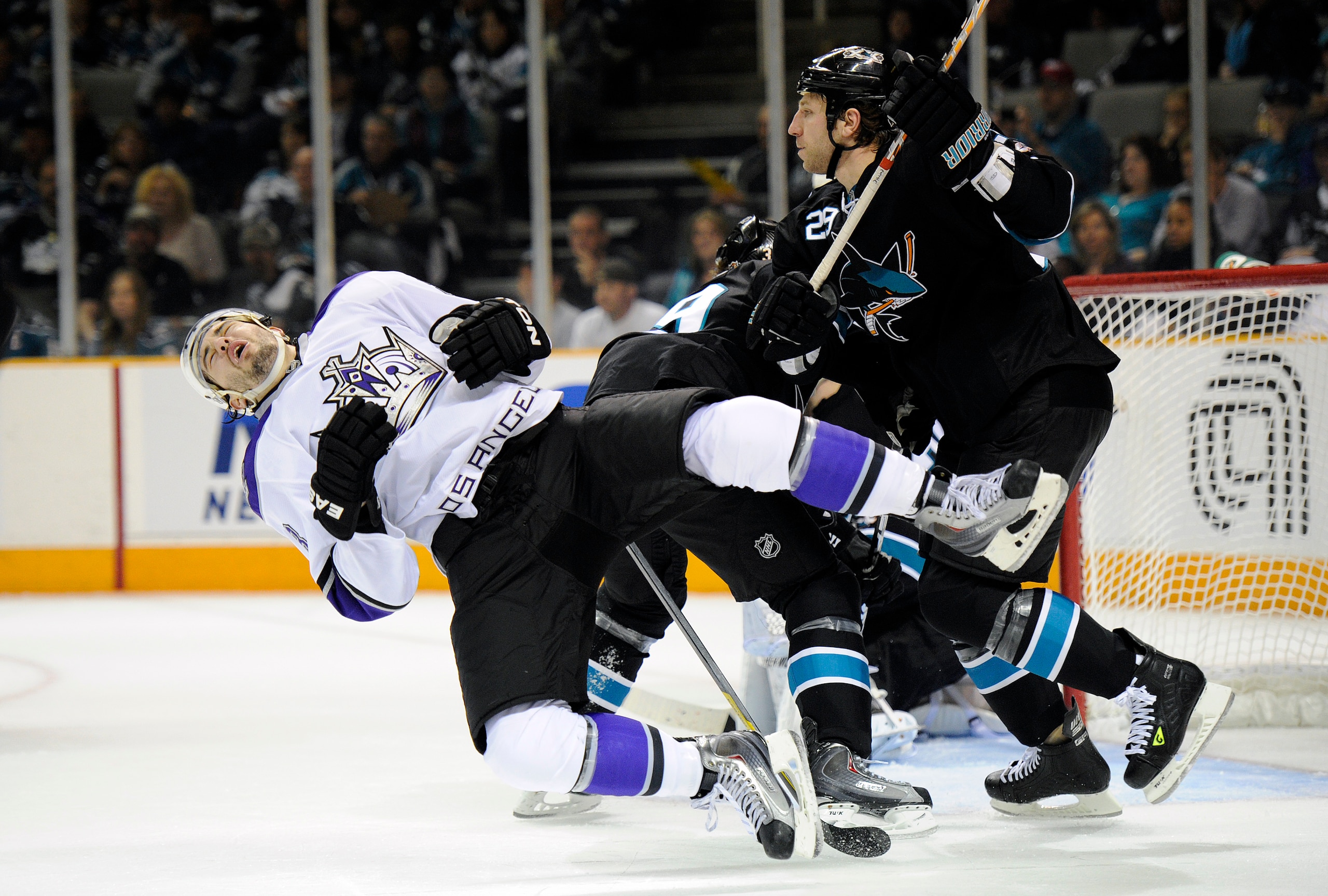 SAN JOSE, CA - APRIL 16: Ryane Clowe #29 the San Jose Sharks gets a penalty for cross checking Drew Doughty #8 of the Los Angeles Kings in Game Two of the Western Conference Quarterfinals during the 2011 NHL Stanley Cup Playoffs at the HP Pavilion on Apri