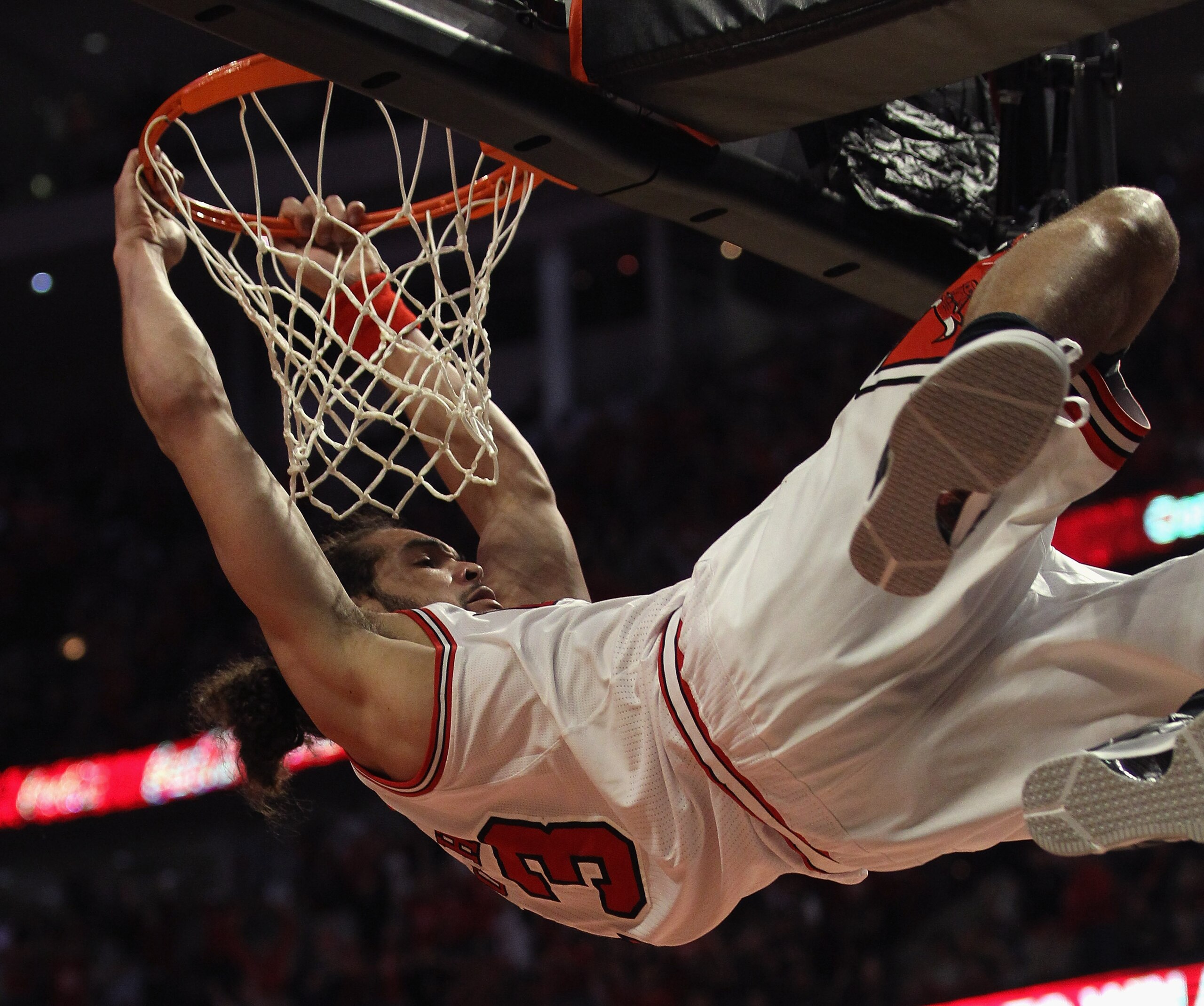 CHICAGO, IL - APRIL 16: Joakim Noah #13 of the Chicago Bulls hangs on the basket after dunking the ball against the Indiana Pacers in Game One of the Eastern Conference Quarterfinals in the 2011 NBA Playoffs at the United Center on April 16, 2011 in Chica CHICAGO, IL - APRIL 16: Joakim Noah #13 of the Chicago Bulls hangs on the basket after dunking the ball against the Indiana Pacers in Game One of the Eastern Conference Quarterfinals in the 2011 NBA Playoffs at the United Center on April 16, 2011 in Chica
