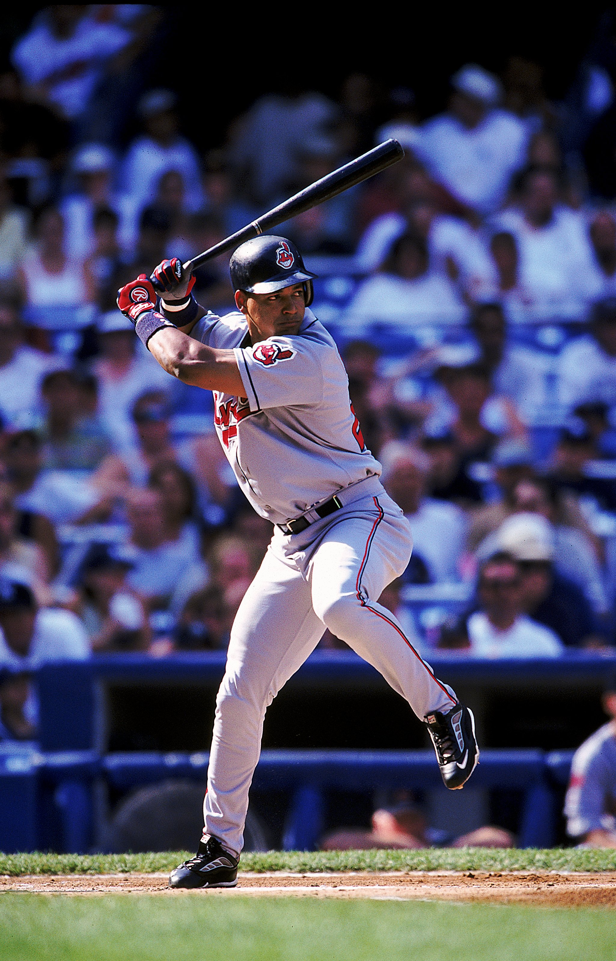24 Jul 1999: Manny Ramirez #24 of the Cleveland Indians steps into the swing during the game against the New York Yankees at Yankee Stadium in the Bronx. The Yankees defeated the Indians 21-1. Mandatory Credit: Ezra O. Shaw  /Allsport