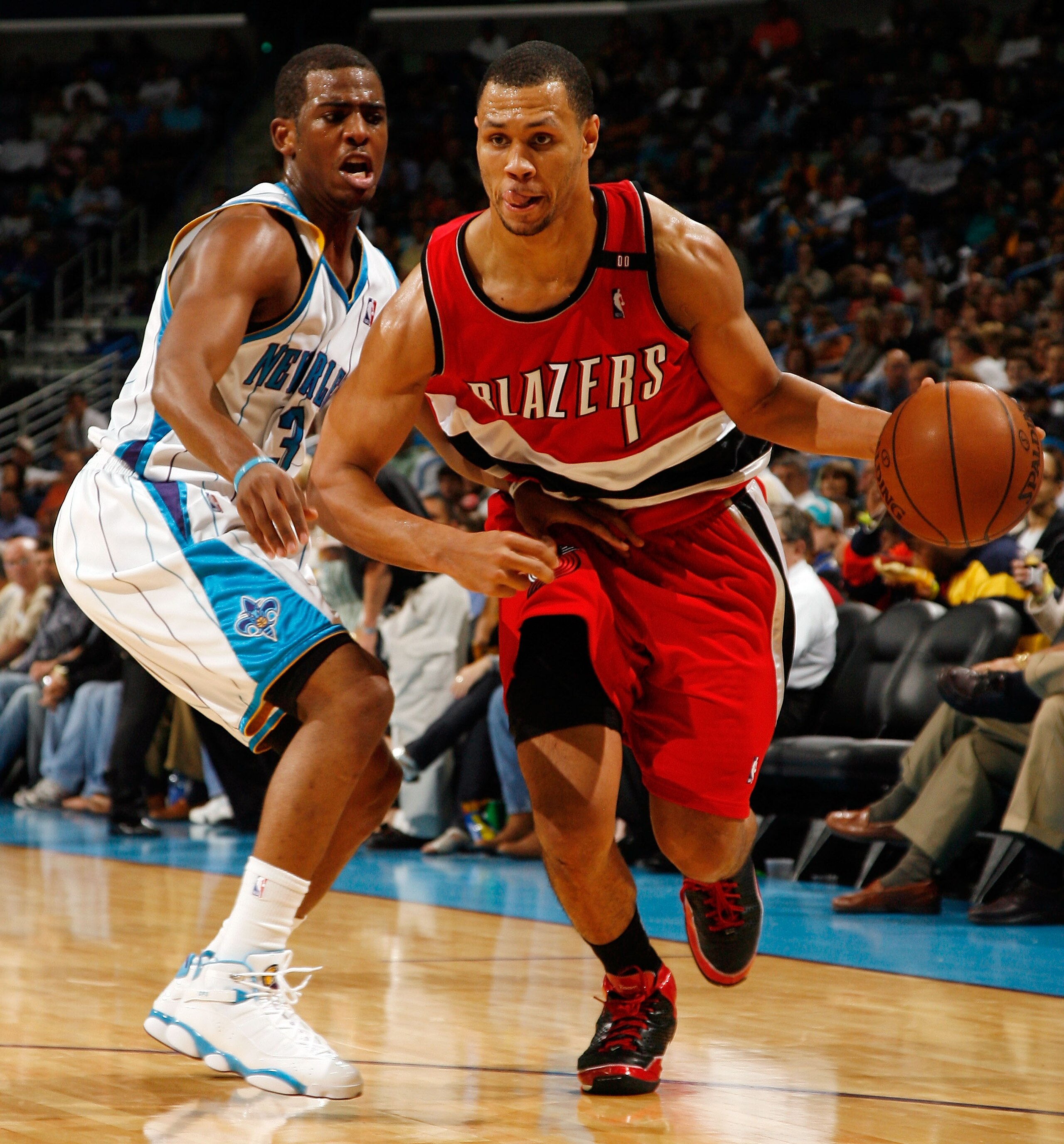 NEW ORLEANS - NOVEMBER 14:  Brandon Roy #7 of the  Portland Trail Blazers drives the ball around Chris Paul #3 of the New Orleans Hornets at the New Orleans Arena on November 14, 2008 in New Orleans, Louisiana.  The Hornets defeated the Trail Blazers 87-8